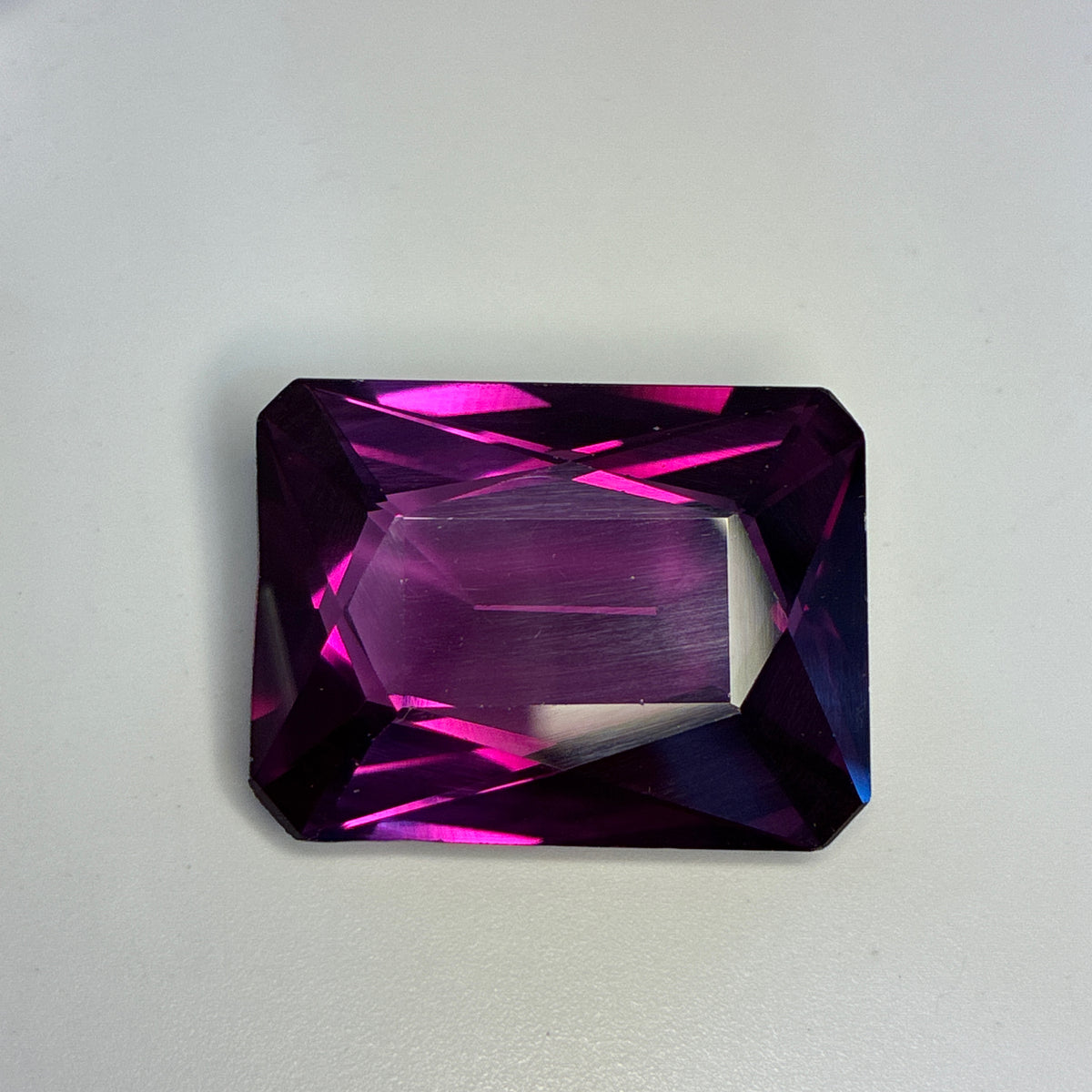 48 carat Reddish Purple Lab Sapphire, 25.7x19.3mm Rectangle cut