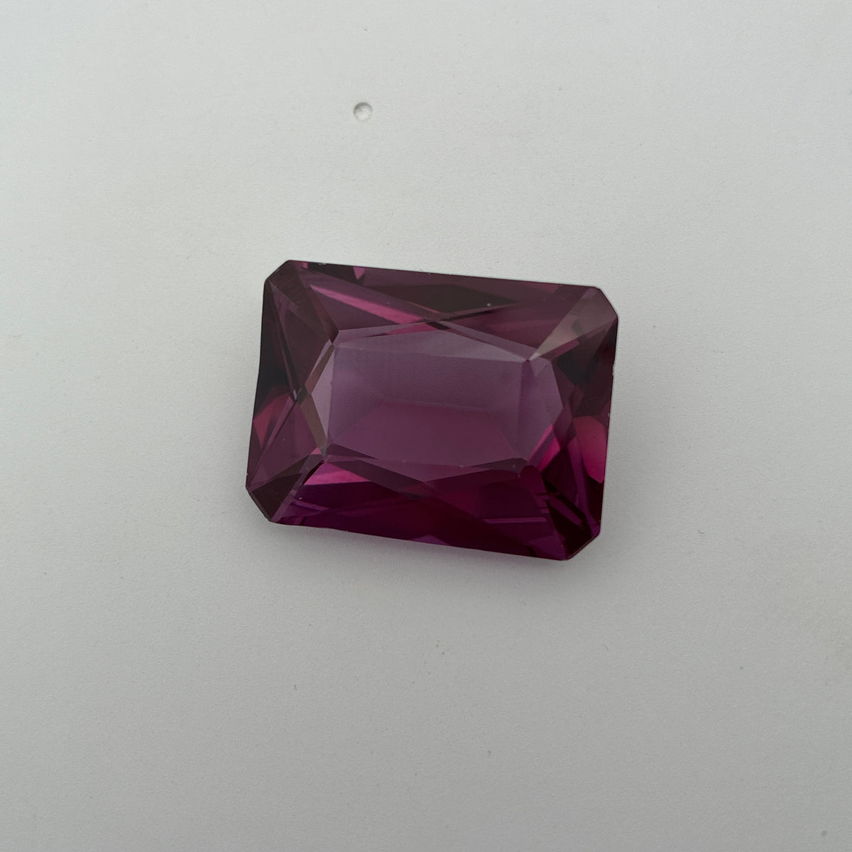 48 carat Reddish Purple Lab Sapphire, 25.7x19.3mm Rectangle cut