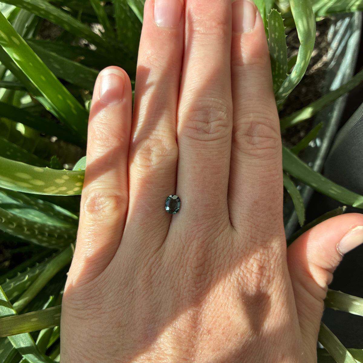 0.64 carat Greenish Blue Spinel, 6x4.8mm Oval cut