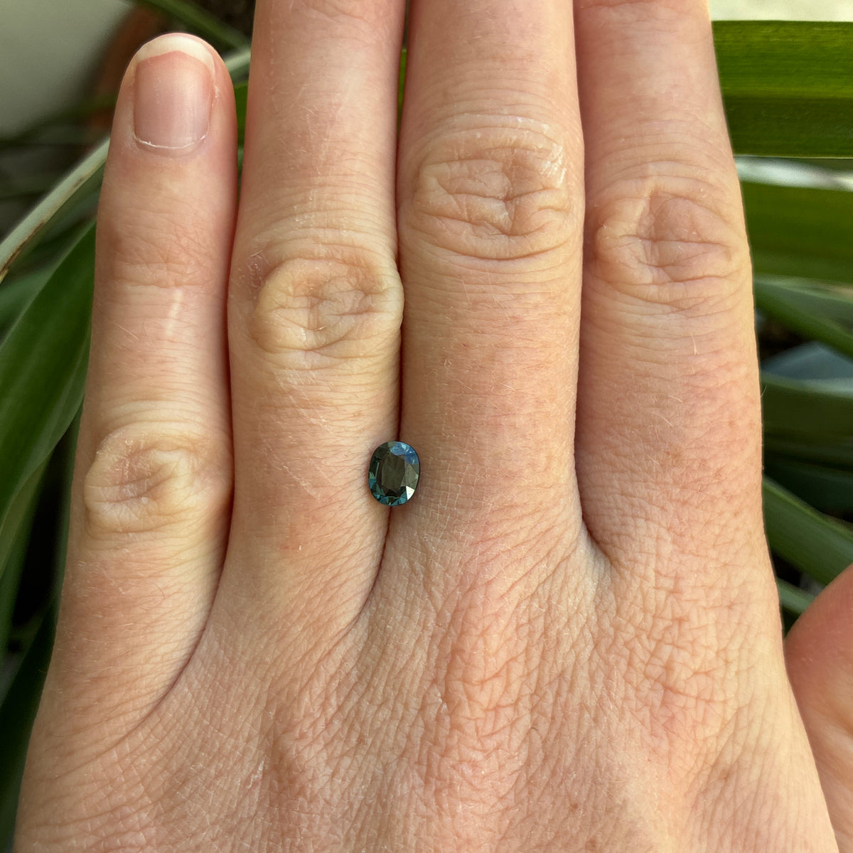 0.64 carat Greenish Blue Spinel, 6x4.8mm Oval cut