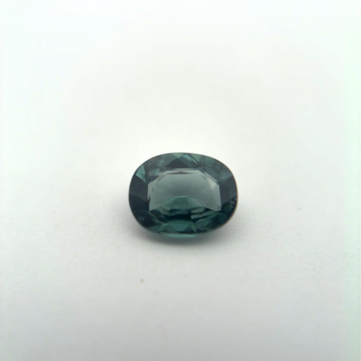 0.64 carat Greenish Blue Spinel, 6x4.8mm Oval cut