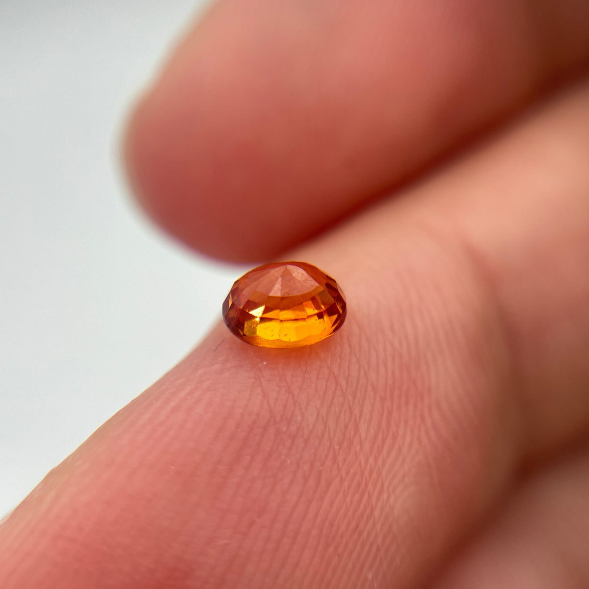 5x4mm Orange Sapphire, BE Treated 0.64 carat Corundum