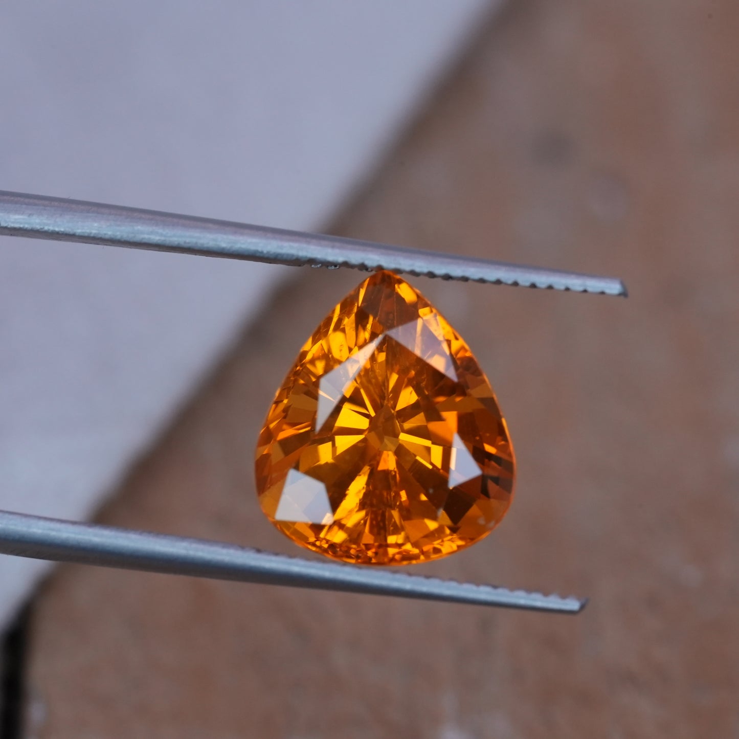 4.22 carat Sapphire 10.45x9.25mm Pear Cut, Orange Yellow, BE Treated
