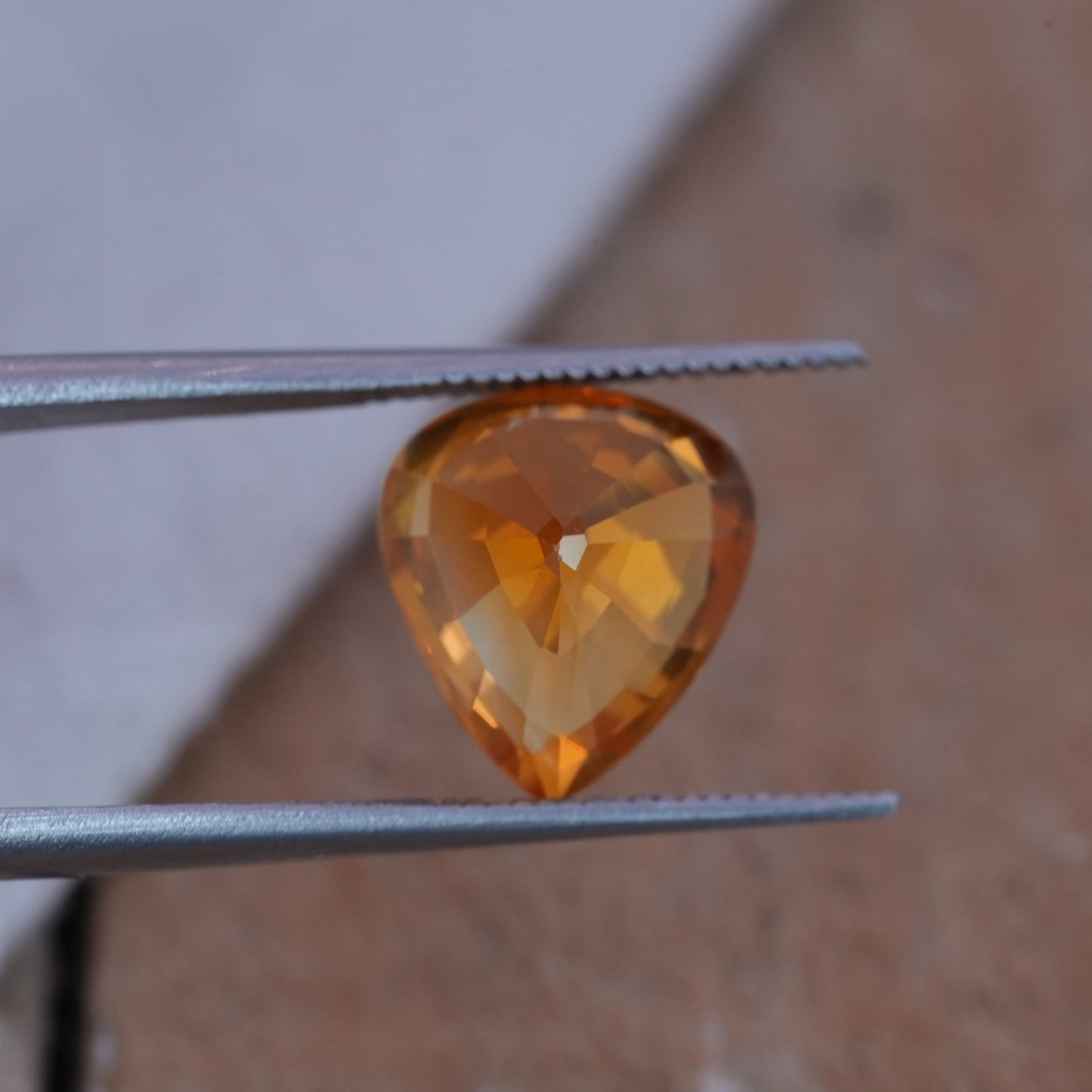 4.22 carat Sapphire 10.45x9.25mm Pear Cut, Orange Yellow, BE Treated