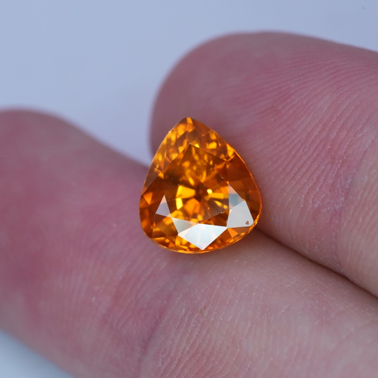 4.22 carat Sapphire 10.45x9.25mm Pear Cut, Orange Yellow, BE Treated