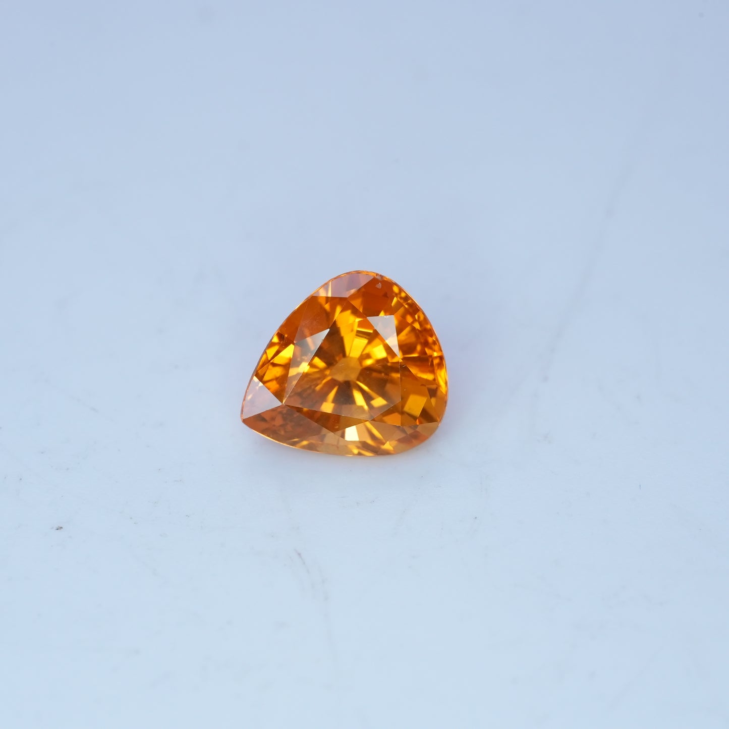 4.22 carat Sapphire 10.45x9.25mm Pear Cut, Orange Yellow, BE Treated