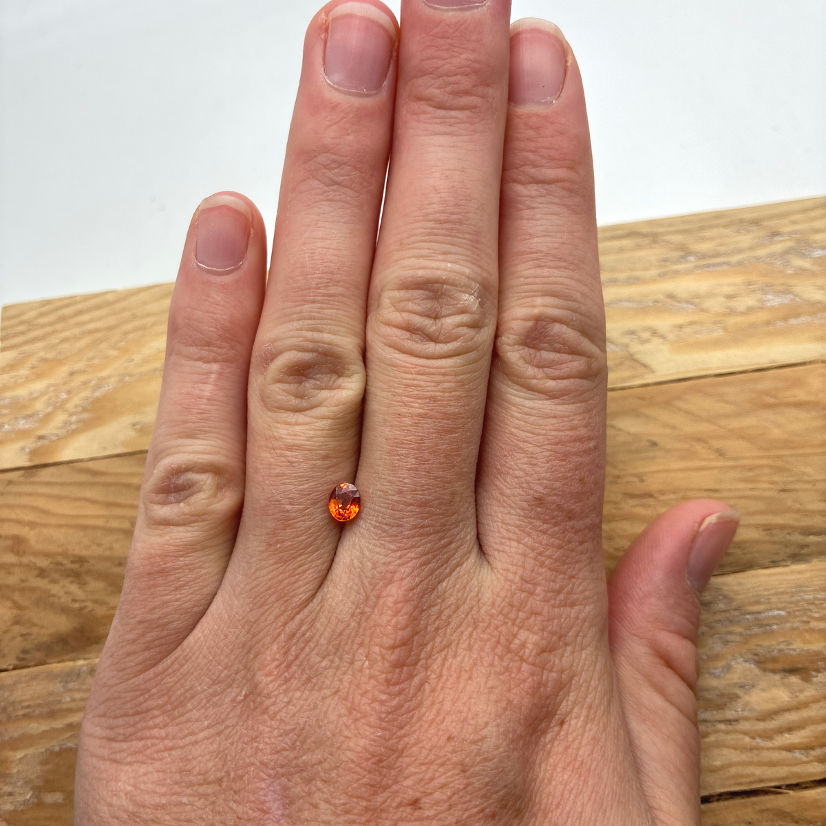 5x4mm Orange Sapphire, BE Treated 0.64 carat Corundum