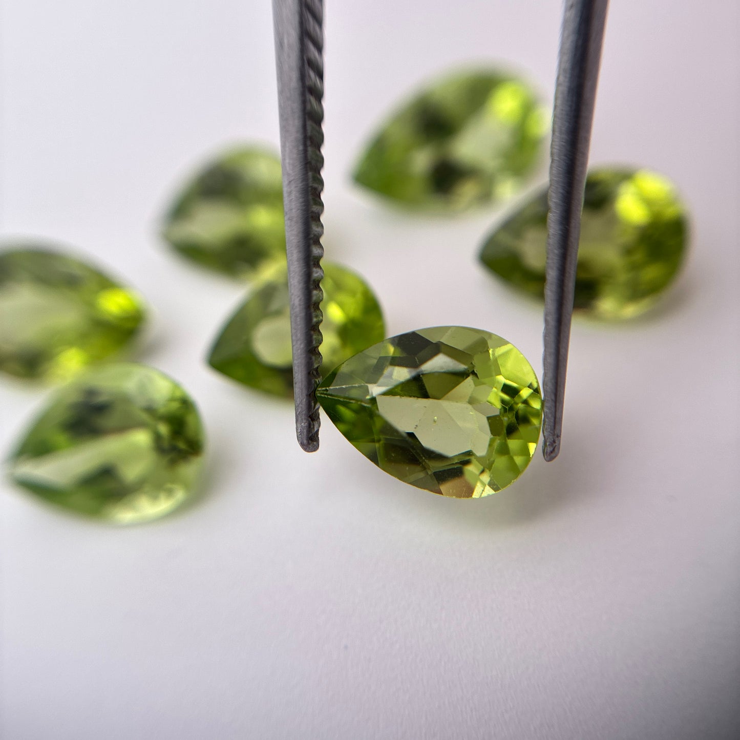 One 8x6mm Green Peridot Pear Cut 1 carat