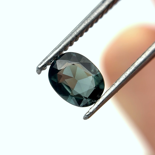 0.64 carat Greenish Blue Spinel, 6x4.8mm Oval cut
