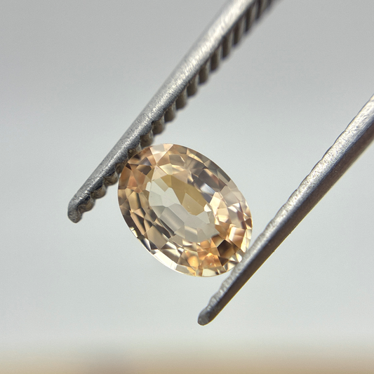 0.77 carat Light Orange Sapphire, 6.5x4.8mm Natural Gemstone