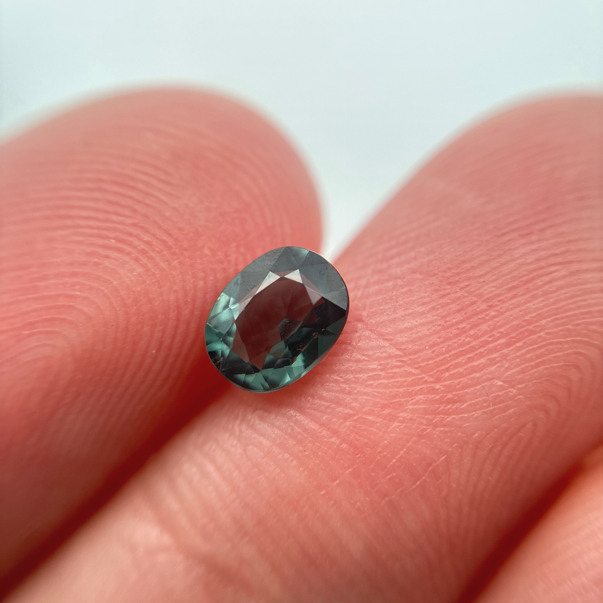 0.64 carat Greenish Blue Spinel, 6x4.8mm Oval cut