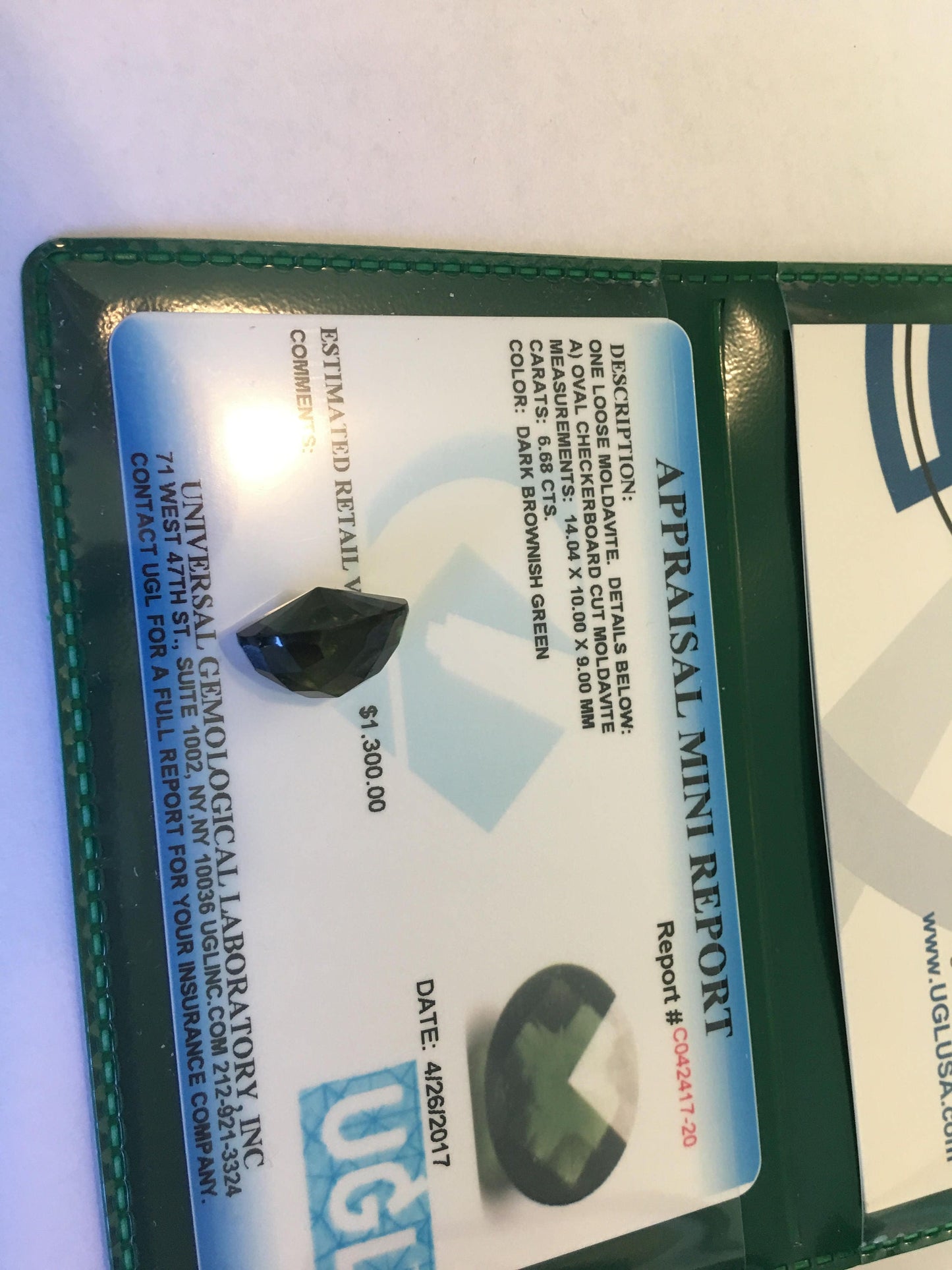 6.68 Carat UGL-USA Certified Moldavite Loose Gemstone Appraised Fancy Oval Checkerboard Cut Faceted Unusual 14x10x9mm