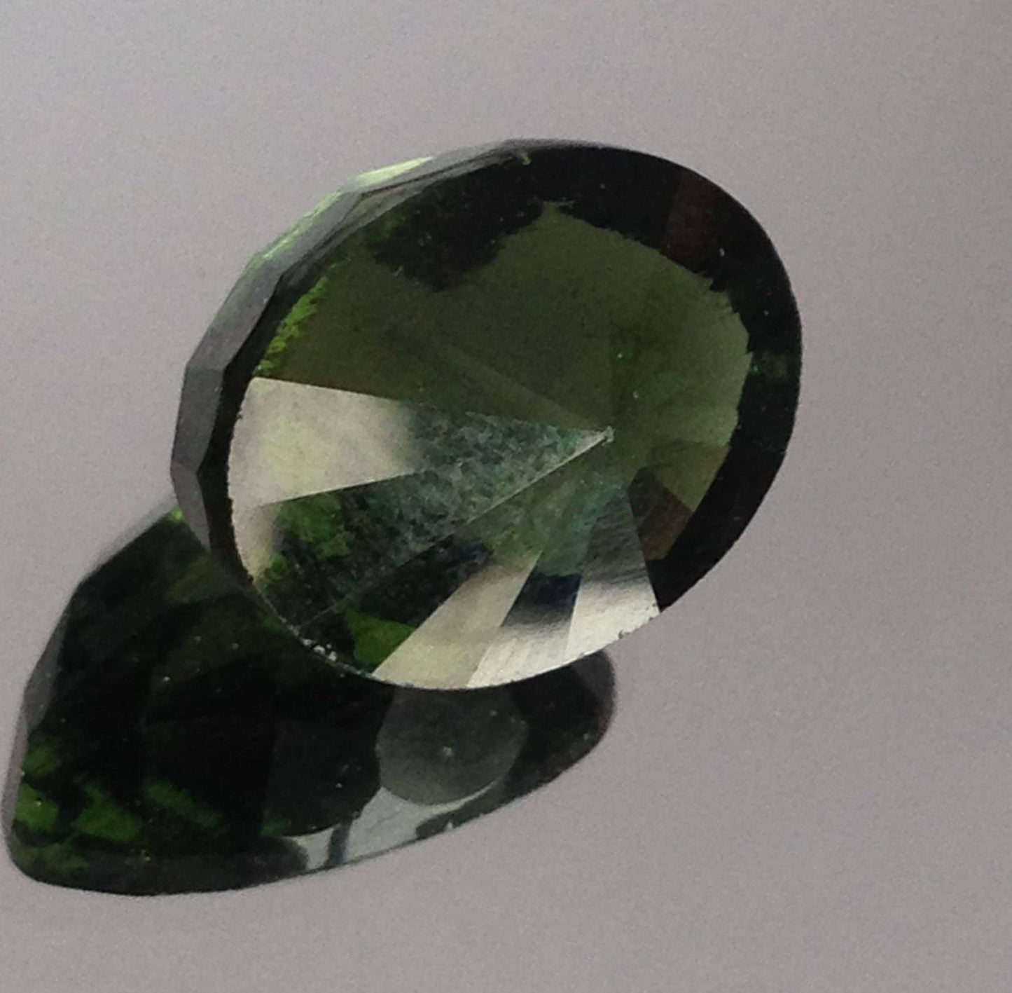 6.68 Carat UGL-USA Certified Moldavite Loose Gemstone Appraised Fancy Oval Checkerboard Cut Faceted Unusual 14x10x9mm