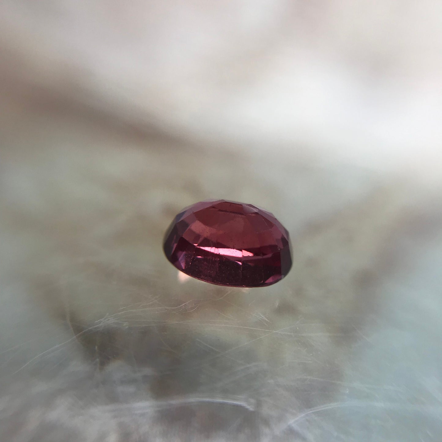 1.31 Carat Natural Red Sapphire 6.7x5mm Oval Cut, BE Treated Orangish Red Sapphire