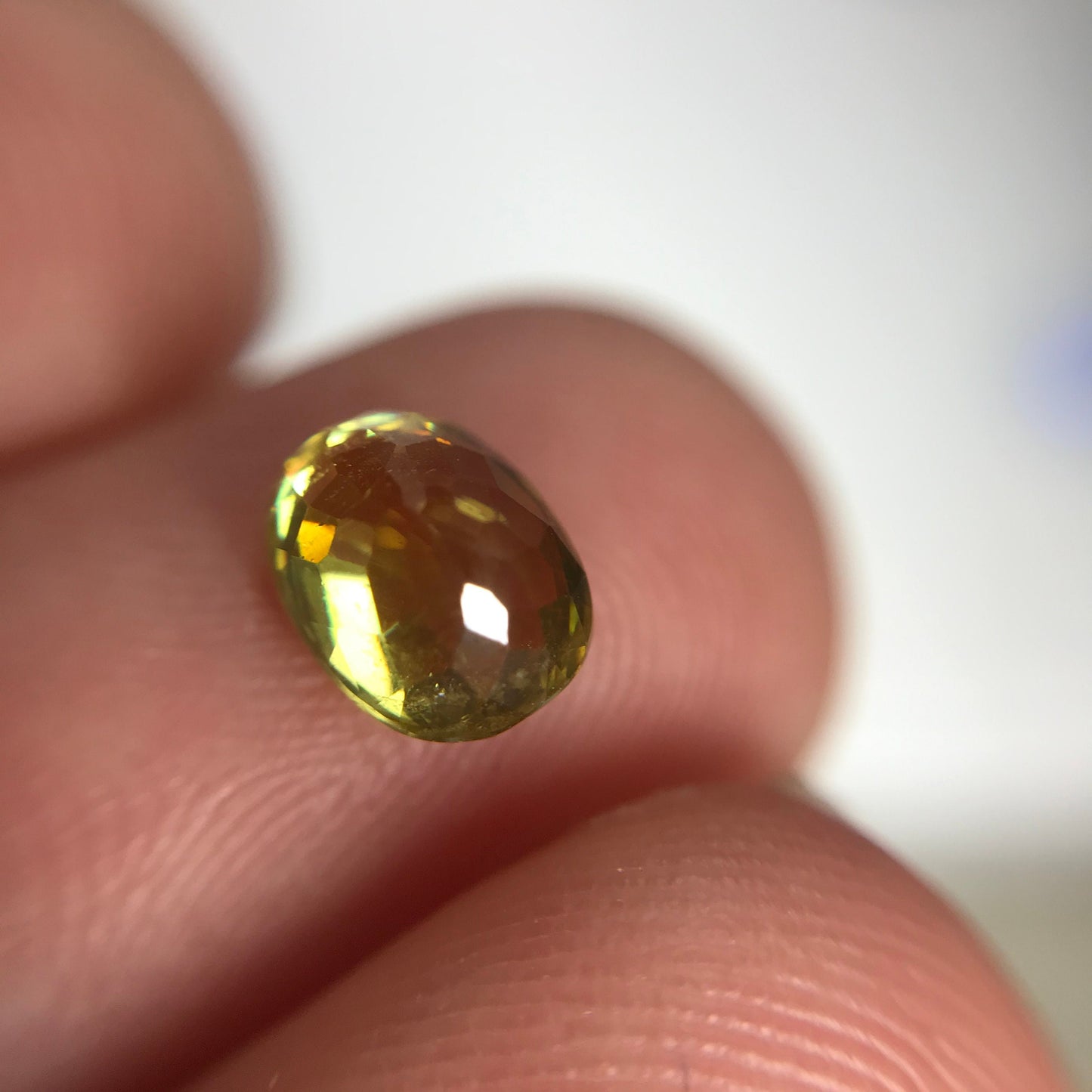 Yellow Sphene 1.23 Carat 6.8x5.2mm Oval Cut, Natural loose wholesale gemstone