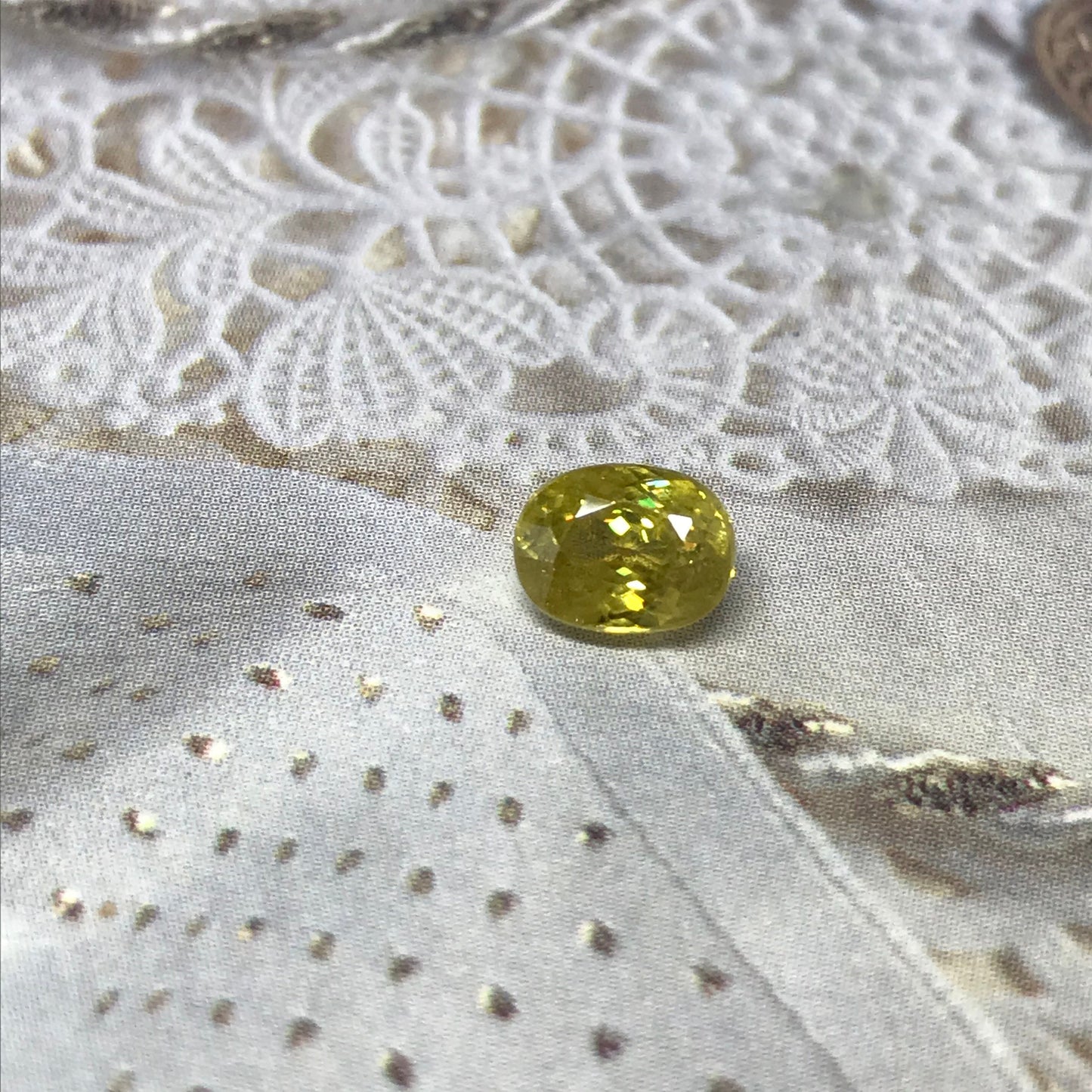 Yellow Sphene 1.23 Carat 6.8x5.2mm Oval Cut, Natural loose wholesale gemstone