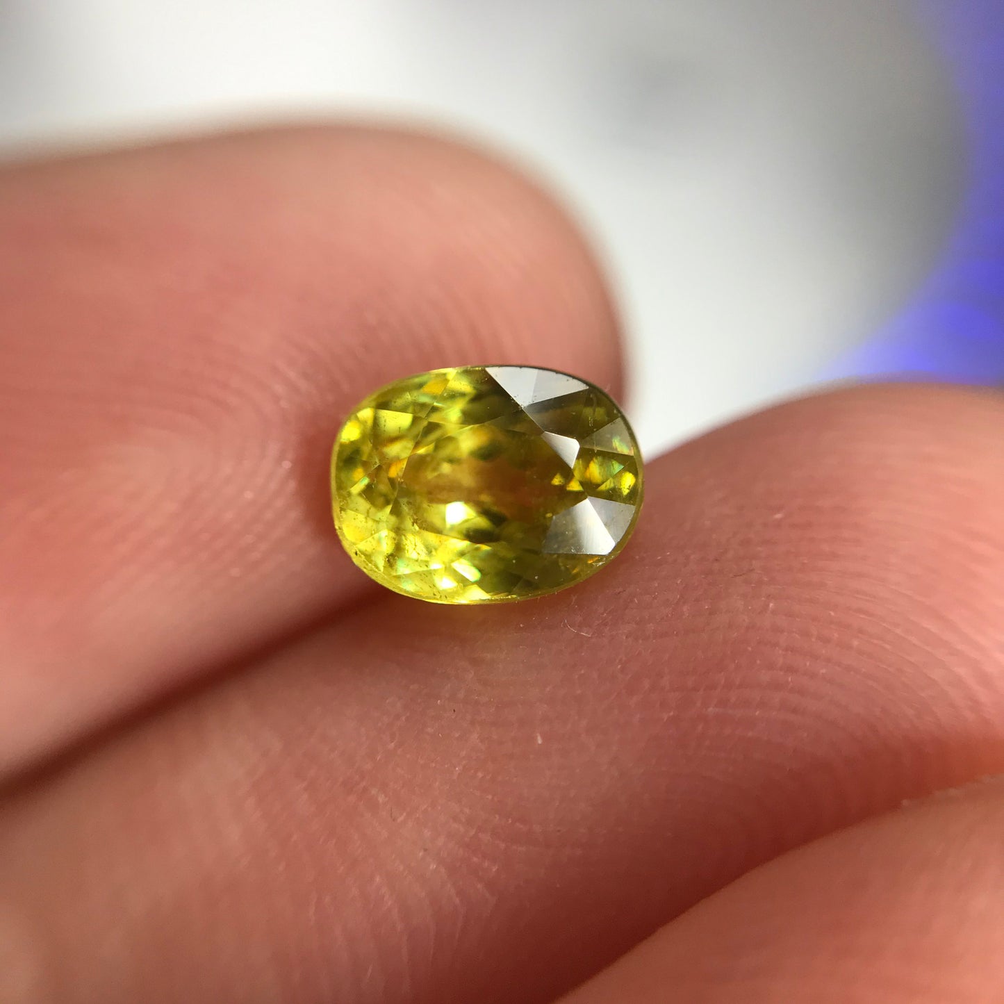 Yellow Sphene 1.23 Carat 6.8x5.2mm Oval Cut, Natural loose wholesale gemstone