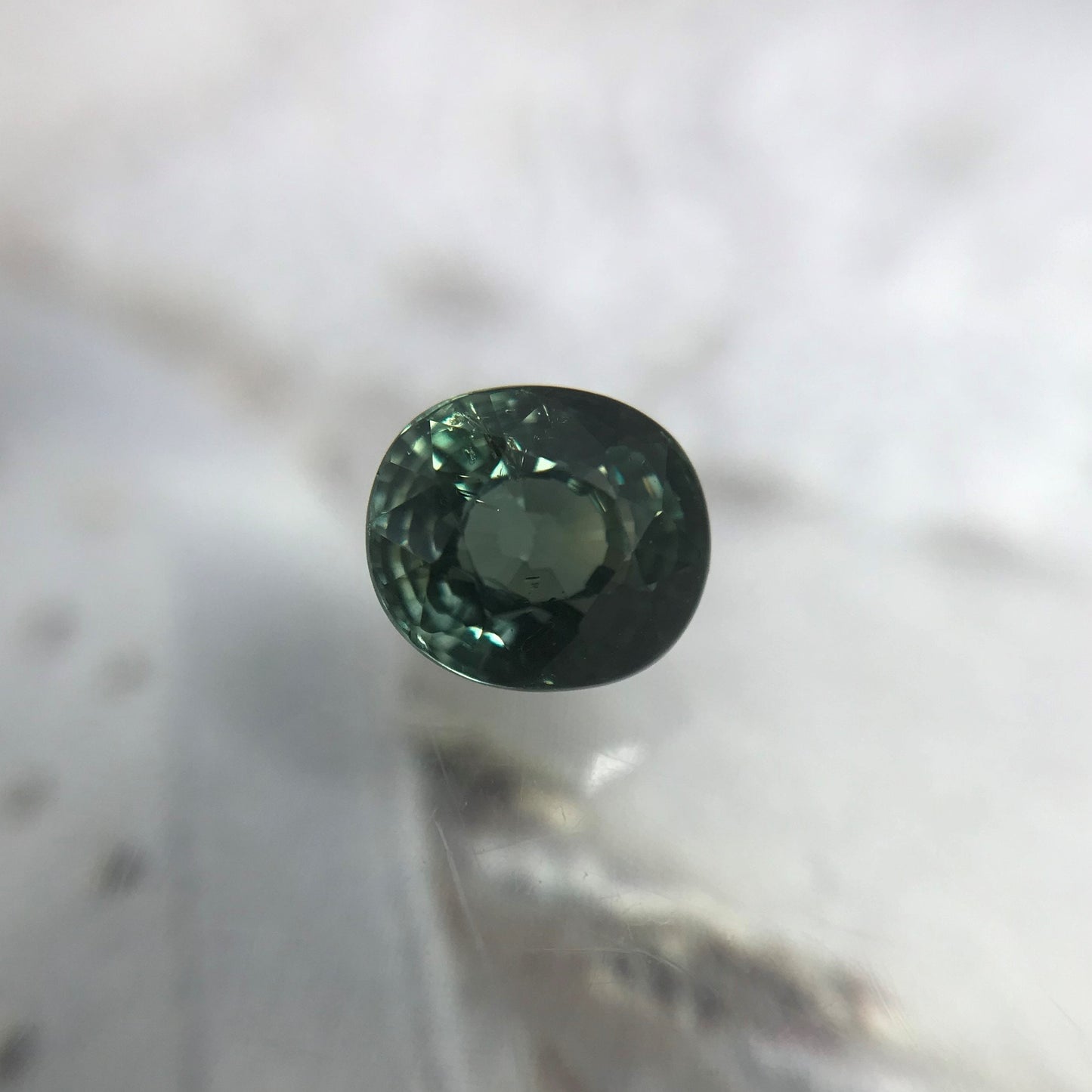 1.10 carat Natural Green Sapphire 5.7x5mm Oval Cut Faceted Loose Bluish Green Sapphire