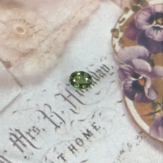 Natural Green Sapphire 5.4 x 4.1 Oval Cut 0.55 carat Corundum Faceted Loose Unmounted Gemstone Earth Mined Genuine Stone Yellowish Green