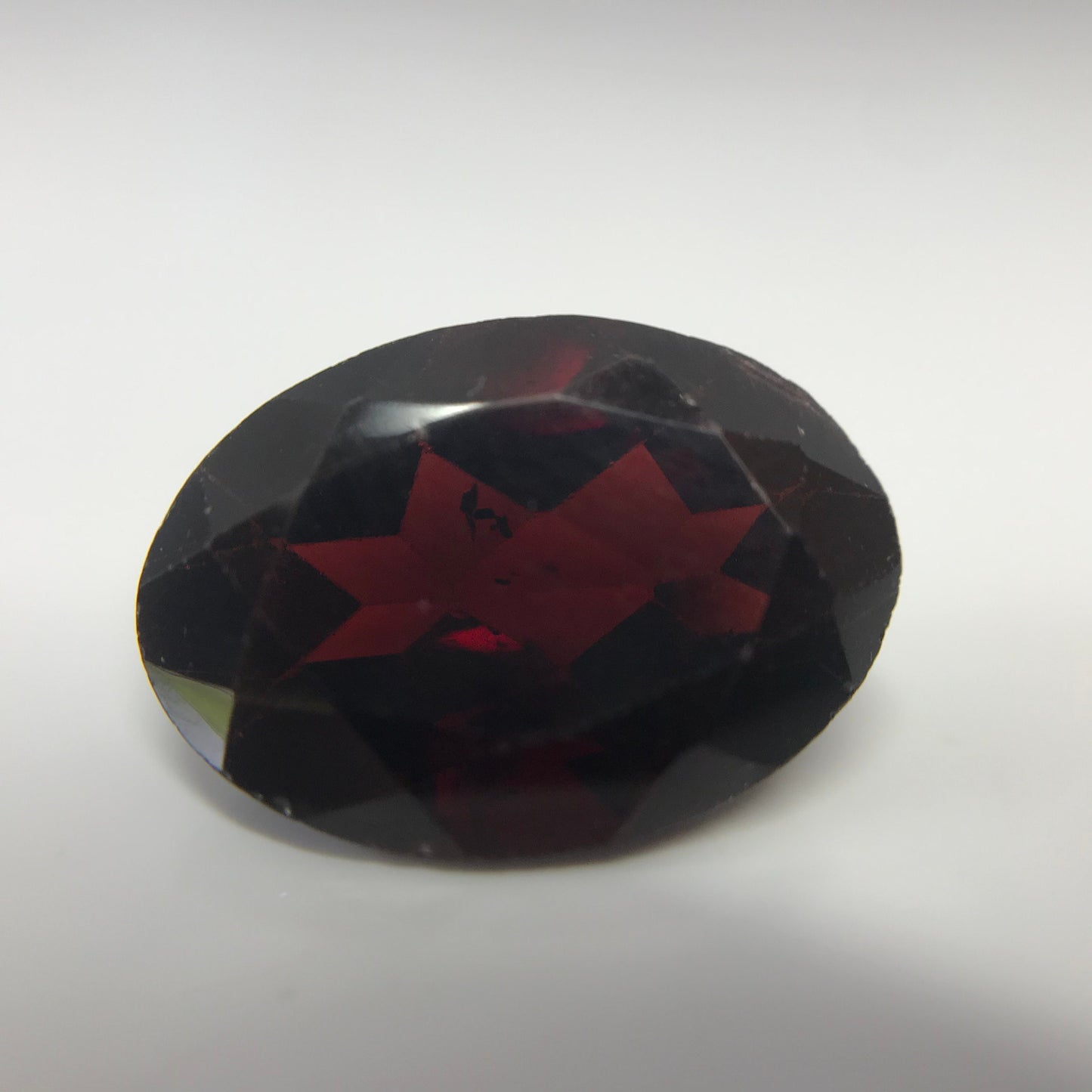 Dark Red Garnet 7.03 Carat 14x10mm Oval Cut