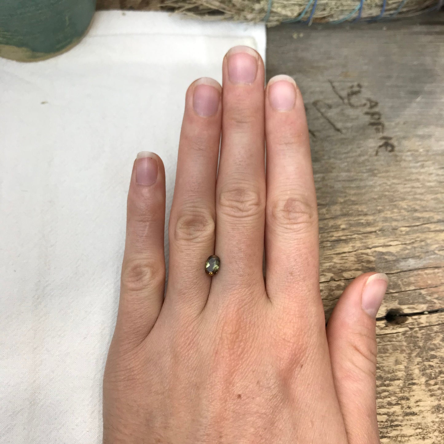 Andalusite 0.72 carat 7x5mm Oval Cut, Faceted Loose Unmounted Gemstone, Green Brown Pleochroism Bicolor Gemstone