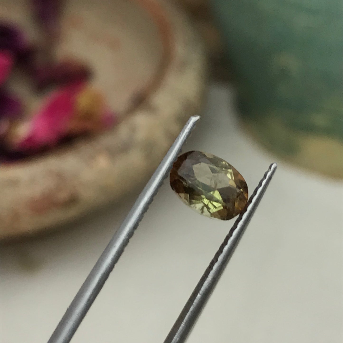 Andalusite 0.72 carat 7x5mm Oval Cut, Faceted Loose Unmounted Gemstone, Green Brown Pleochroism Bicolor Gemstone