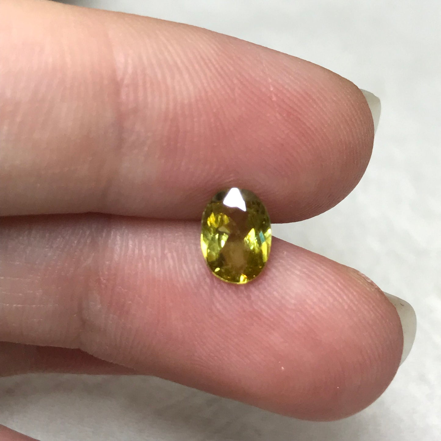 0.96 ct Yellow Sphene 7.5x5.5mm Oval Cut, Natural Untreated from Madagascar, 1 carat Greenish Yellow Sphene with Rainbow Flashes