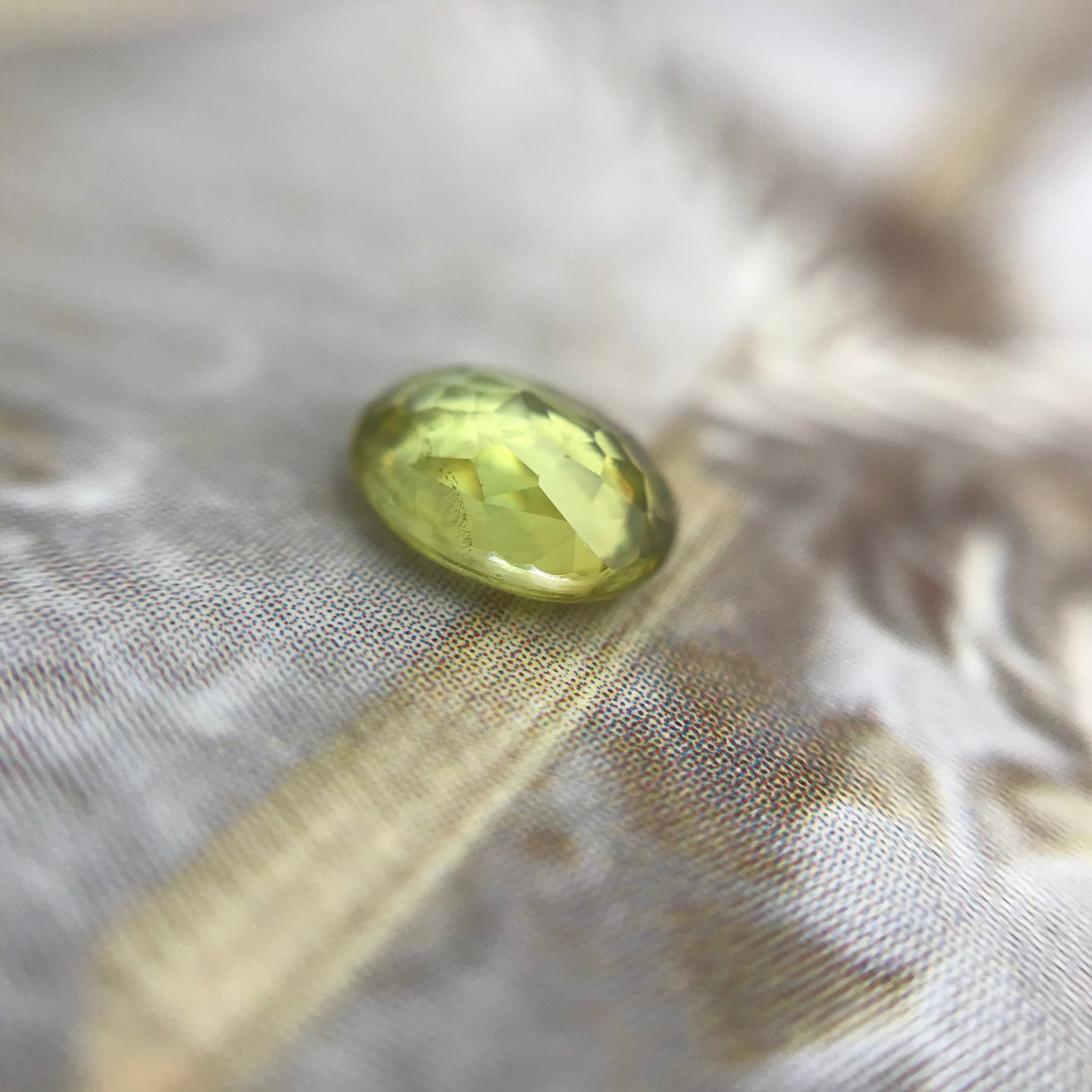 Yellowish Green Sphene 6.5x5.5mm Oval Cut 0.99 carat, Natural Madagascar Sphene, Faceted Loose Titanite