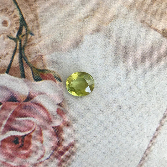 Yellowish Green Sphene 6.5x5.5mm Oval Cut 0.99 carat, Natural Madagascar Sphene, Faceted Loose Titanite