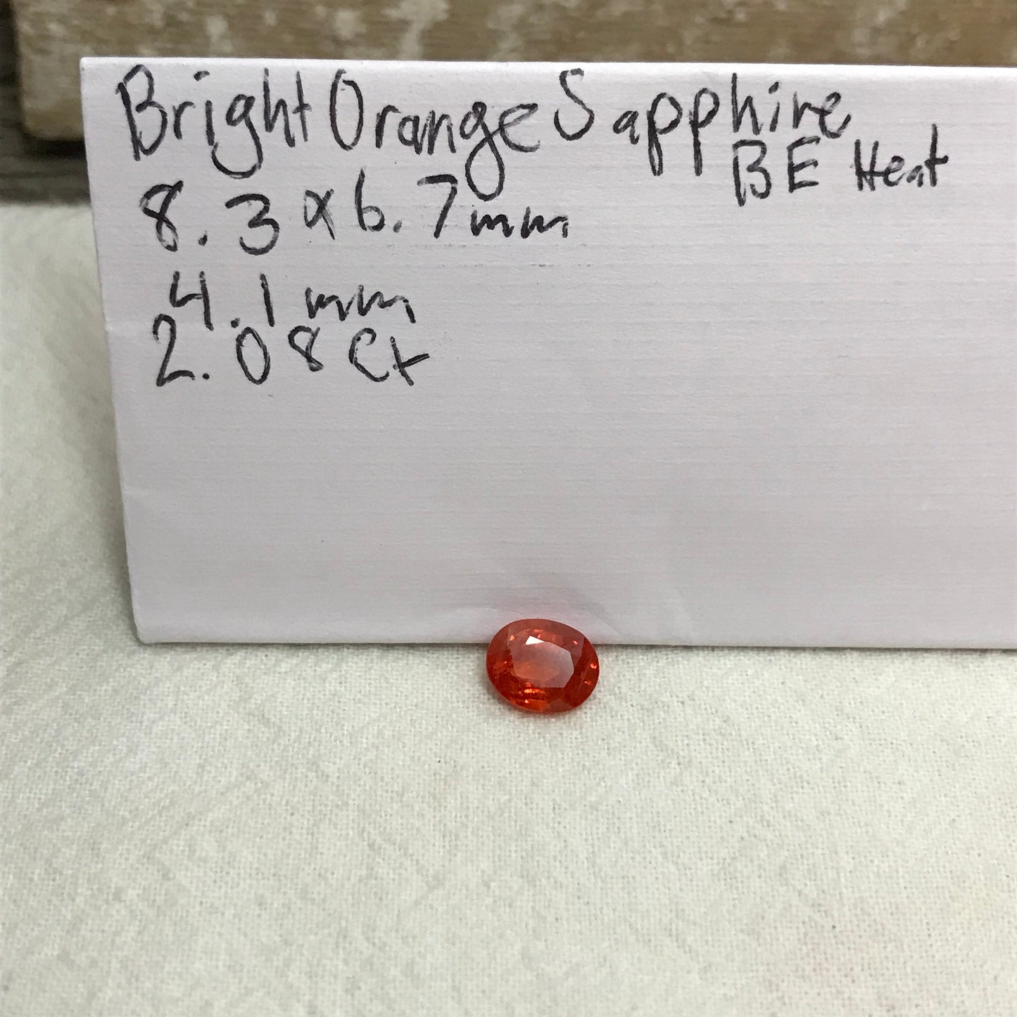 2 Carat Reddish Orange Sapphire 8.3x6.7mm Oval Cut, Beryllium Treated, Faceted Loose Unmounted Gemstone