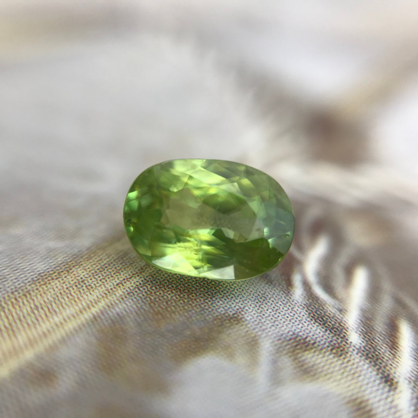 1.10 ct Yellowish Green Sphene 7x5mm Oval Cut, Natural Madagascar Sphene, Faceted Loose Titanite
