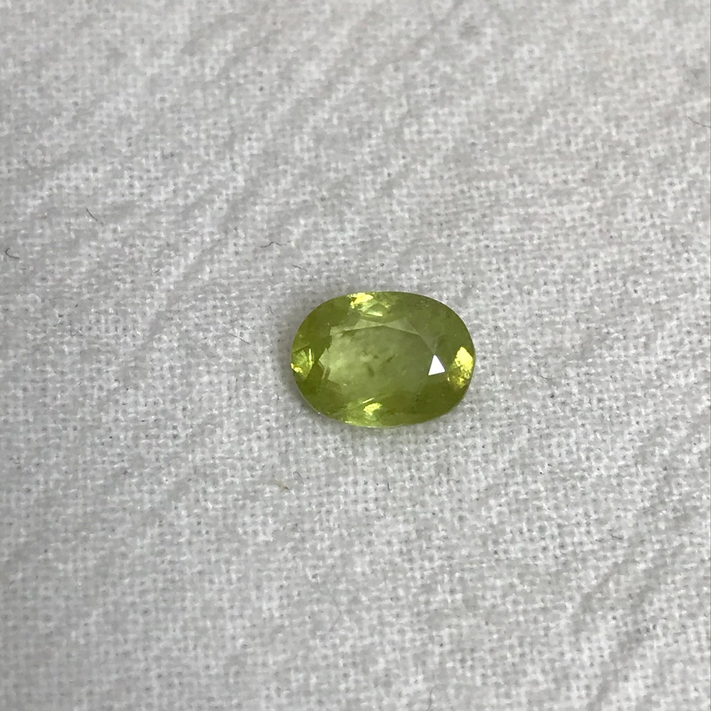 1.14 ct Yellowish Green Sphene 7.4x5.4mm Oval Cut, Natural Madagascar Sphene, Faceted Loose Gemstone