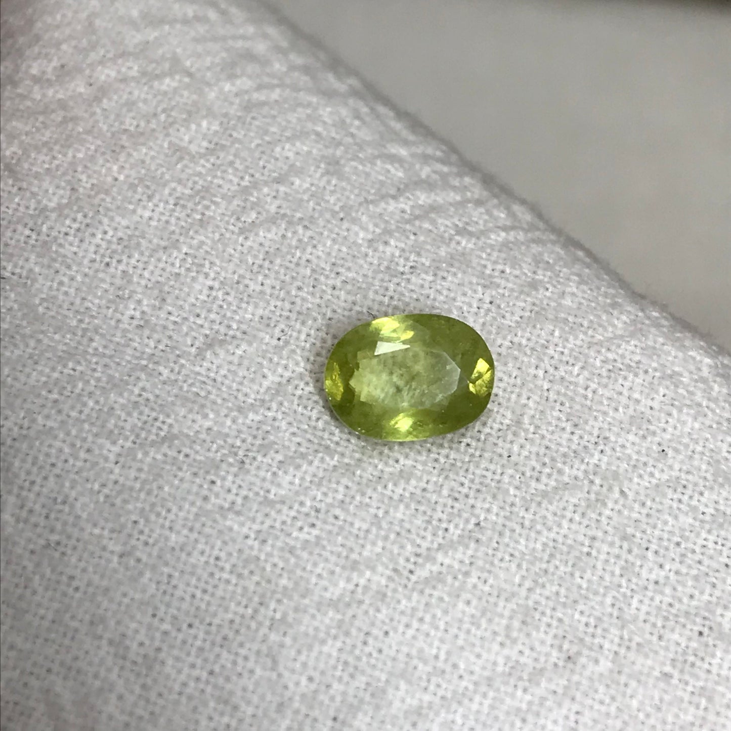 1.14 ct Yellowish Green Sphene 7.4x5.4mm Oval Cut, Natural Madagascar Sphene, Faceted Loose Gemstone