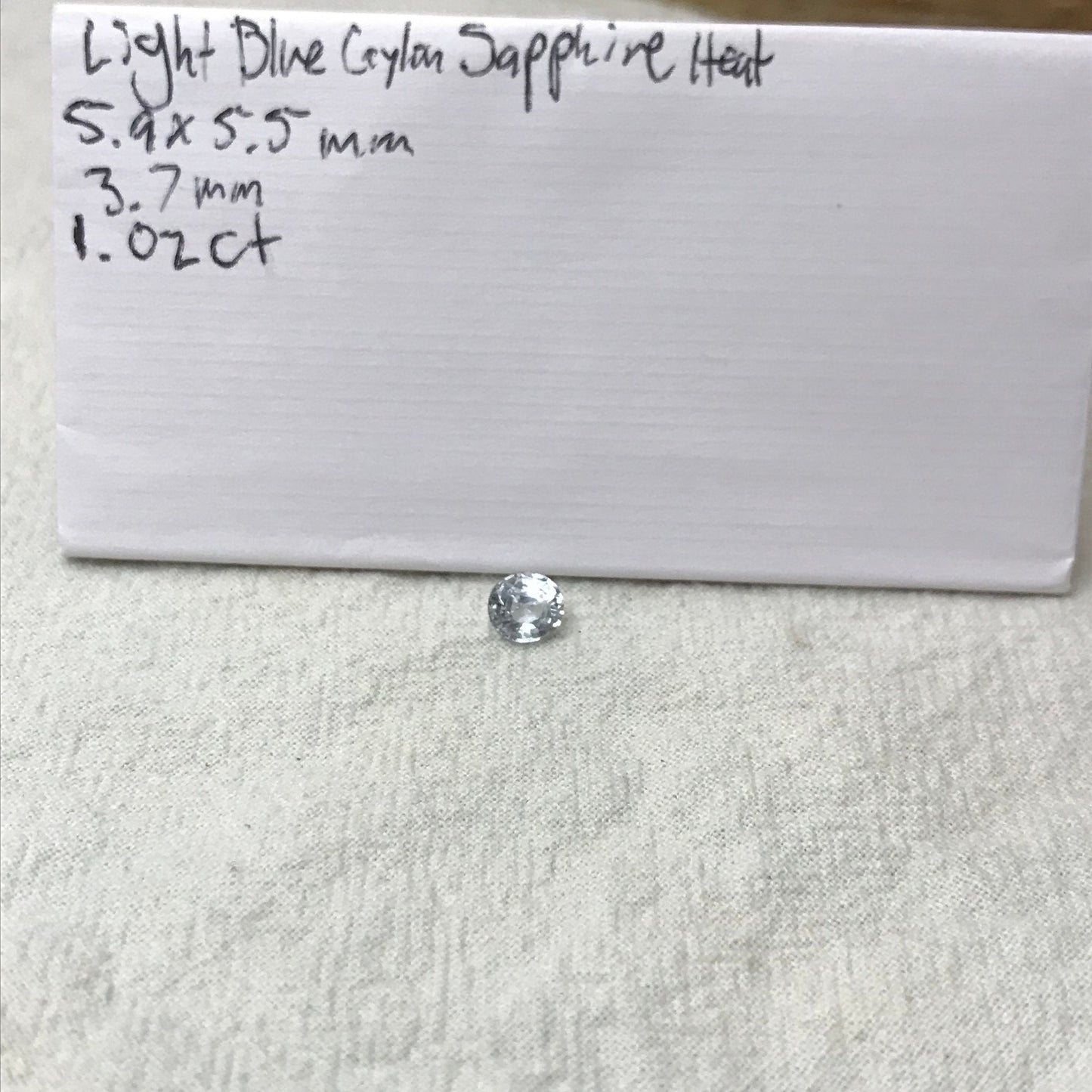 Natural Light Sapphire 6x5.5mm Oval 1.02 Carat Loose Faceted Corundum Light Ice Blue Sapphire, Nearly Colorless, Almost White Sapphire