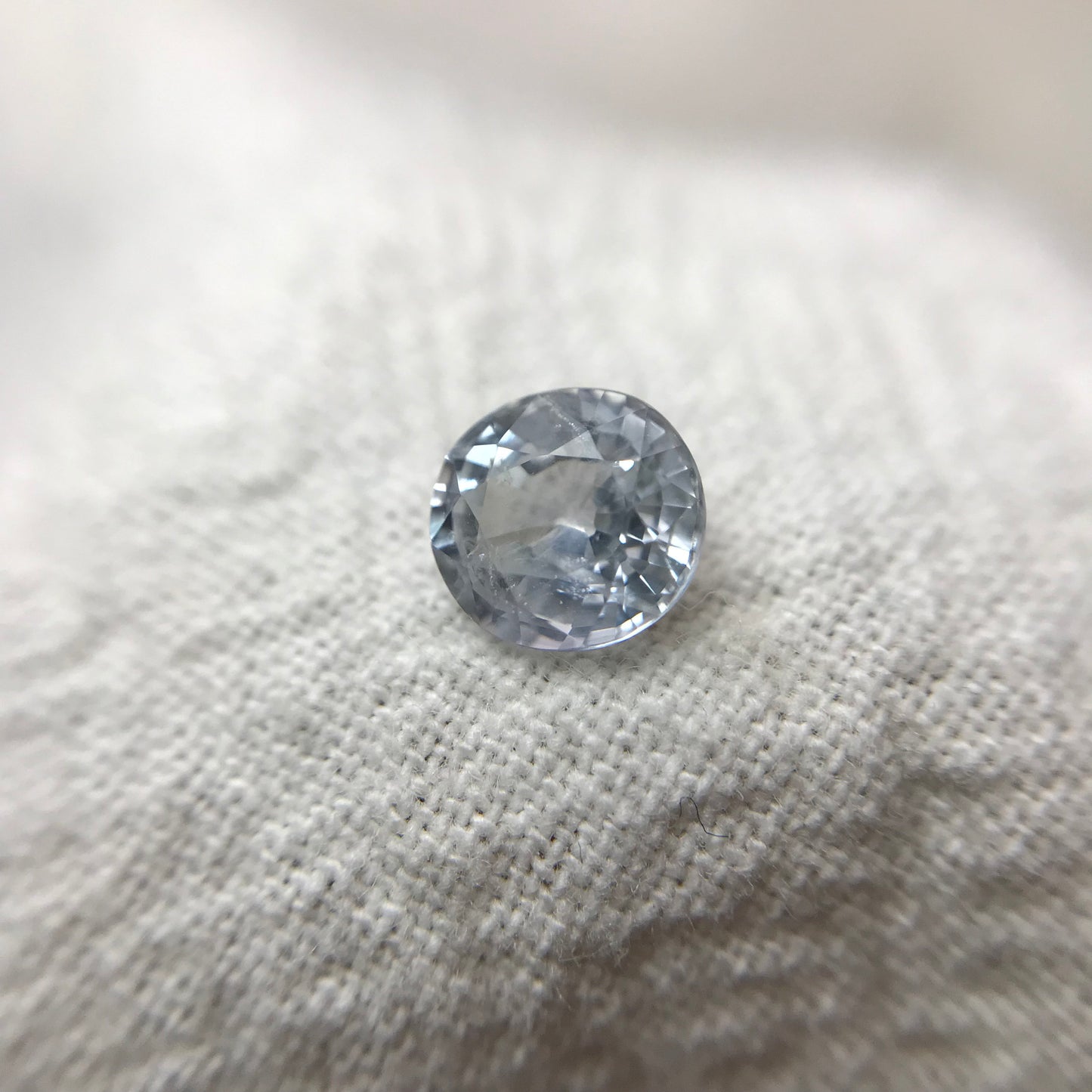 Natural Light Sapphire 6x5.5mm Oval 1.02 Carat Loose Faceted Corundum Light Ice Blue Sapphire, Nearly Colorless, Almost White Sapphire