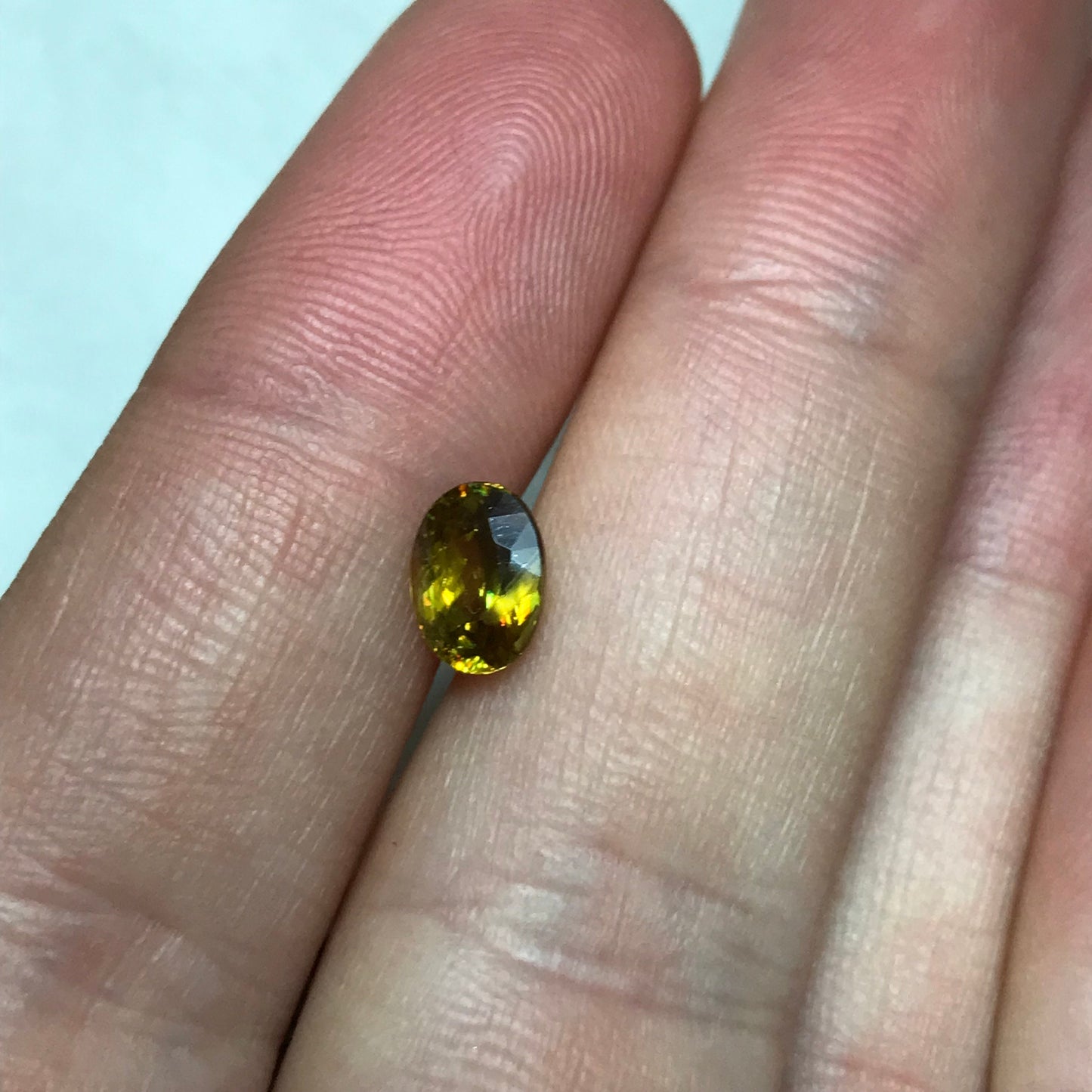 1.14 Ct Yellow Sphene, 7.3x5.3mm Oval Cut, Sphene with Rainbow Fire and Cool Inclusion, Natural Madagascar Sphene, Faceted Loose Titanite