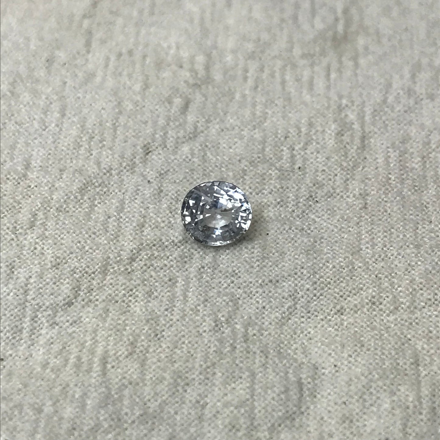 Natural Light Sapphire 6x5.5mm Oval 1.02 Carat Loose Faceted Corundum Light Ice Blue Sapphire, Nearly Colorless, Almost White Sapphire