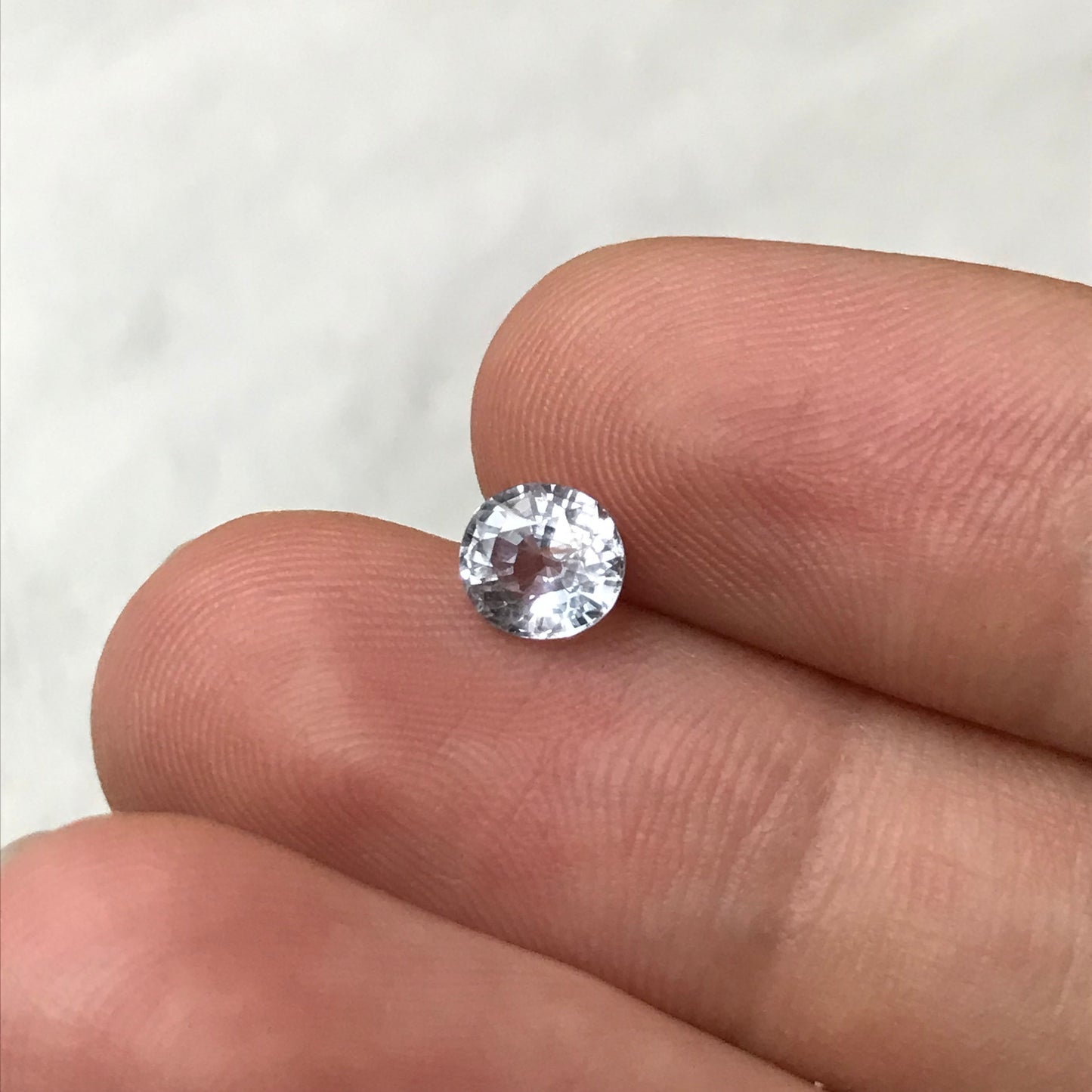 Natural Light Sapphire 6x5.5mm Oval 1.02 Carat Loose Faceted Corundum Light Ice Blue Sapphire, Nearly Colorless, Almost White Sapphire