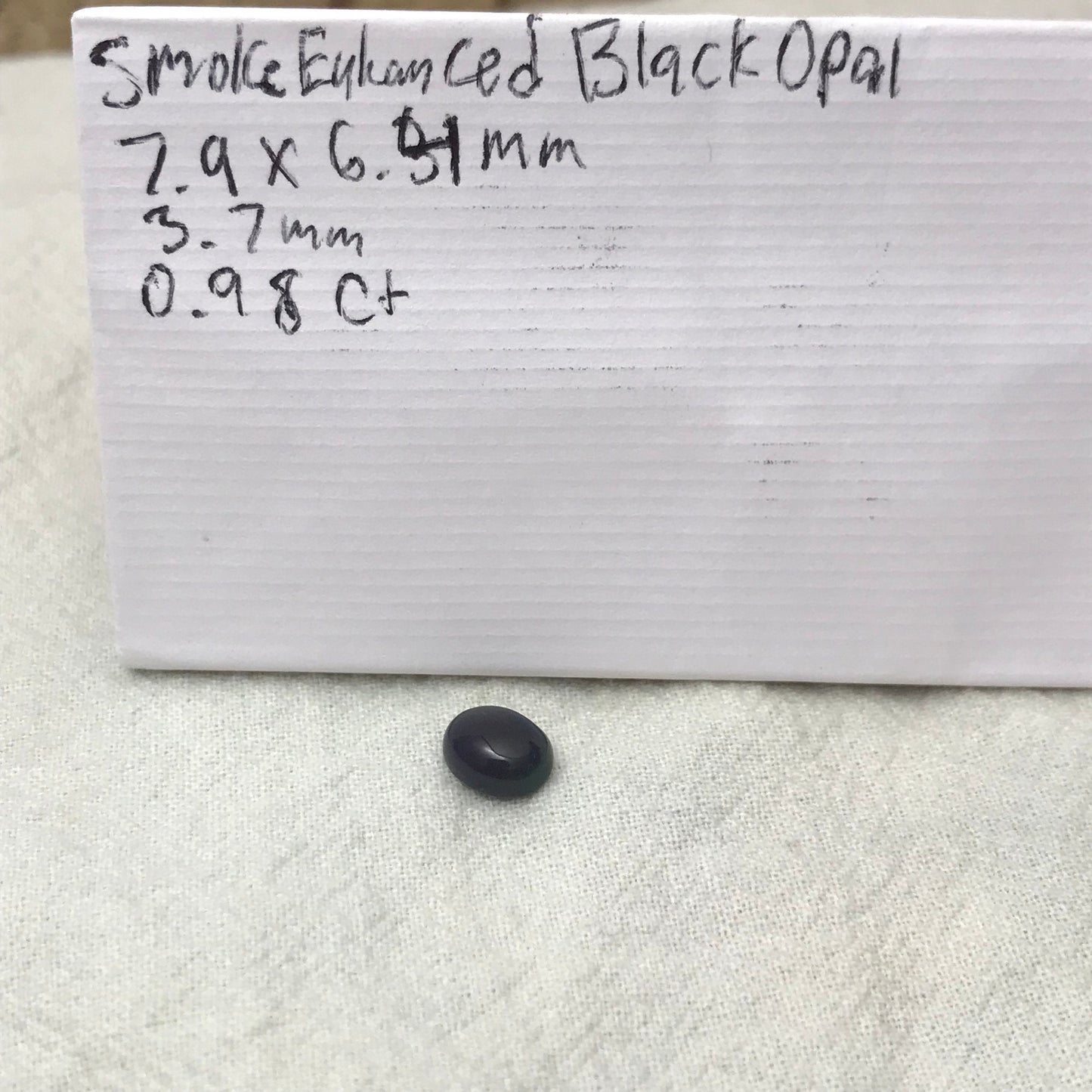 Black Opal 0.98 carat 8x6.5mm Oval Cabochon, Green Orange & Yellow Play of Color, Smoke Enhanced Natural Opal