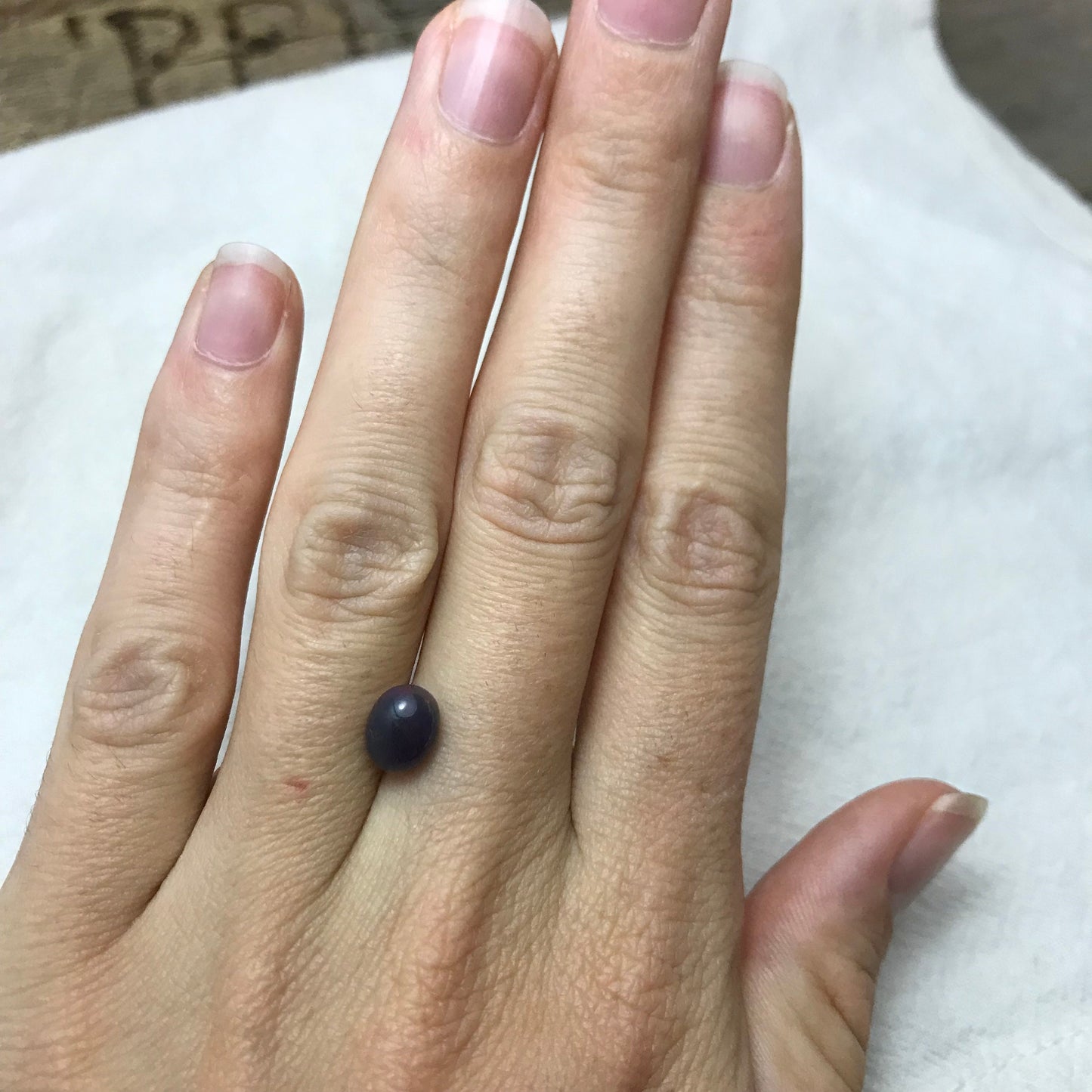 Black Opal 0.98 carat 8x6.5mm Oval Cabochon, Green Orange & Yellow Play of Color, Smoke Enhanced Natural Opal