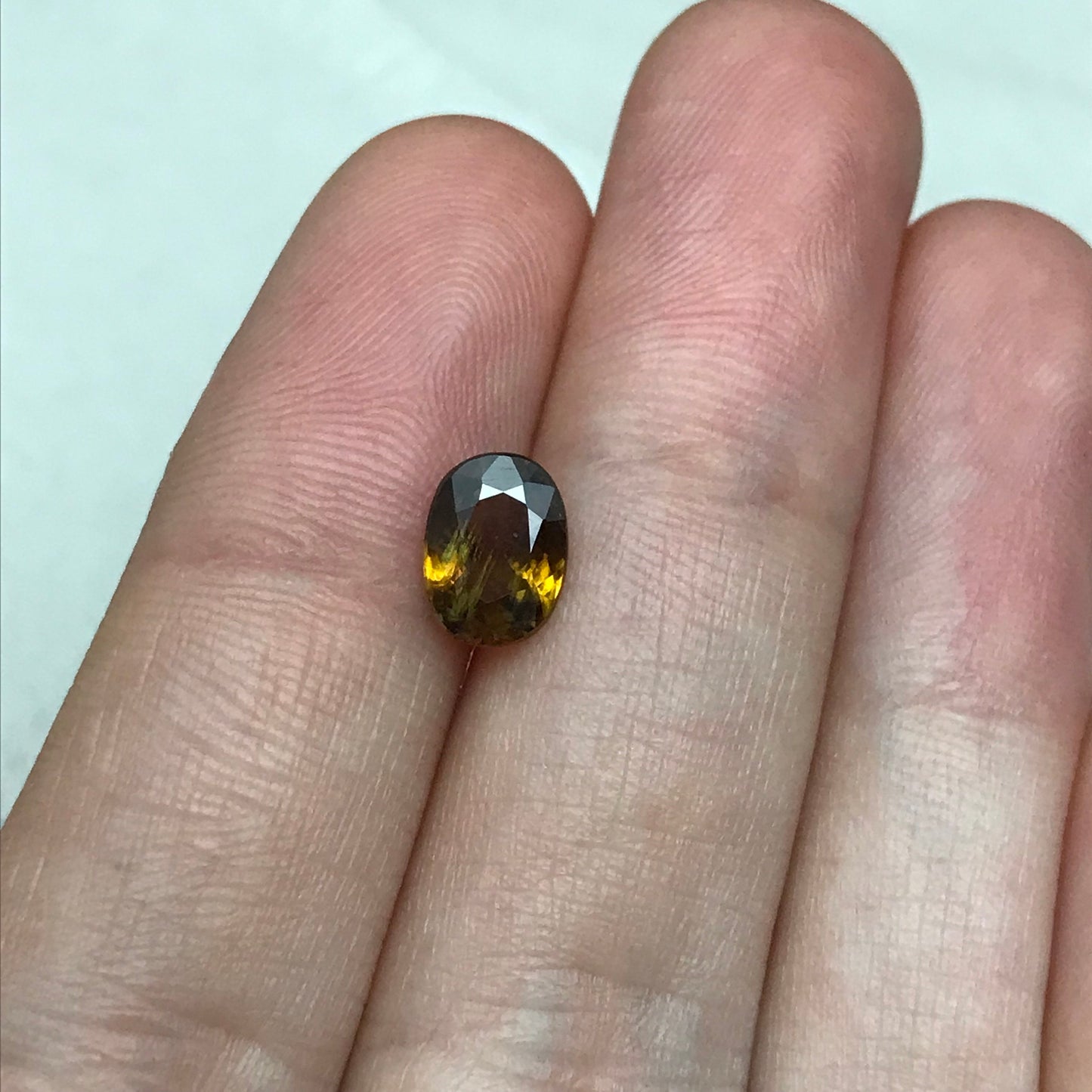 Brownish Yellow Sphene 1.43 Carat 8.3x6.2mm Oval Cut Loose Gemstone