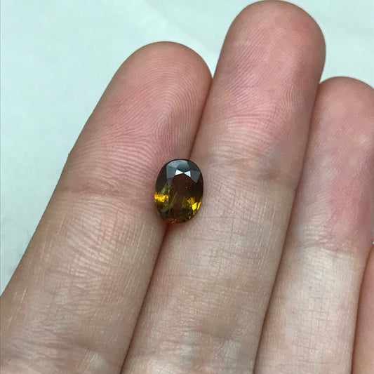 Brownish Yellow Sphene 1.43 Carat 8.3x6.2mm Oval Cut Loose Gemstone