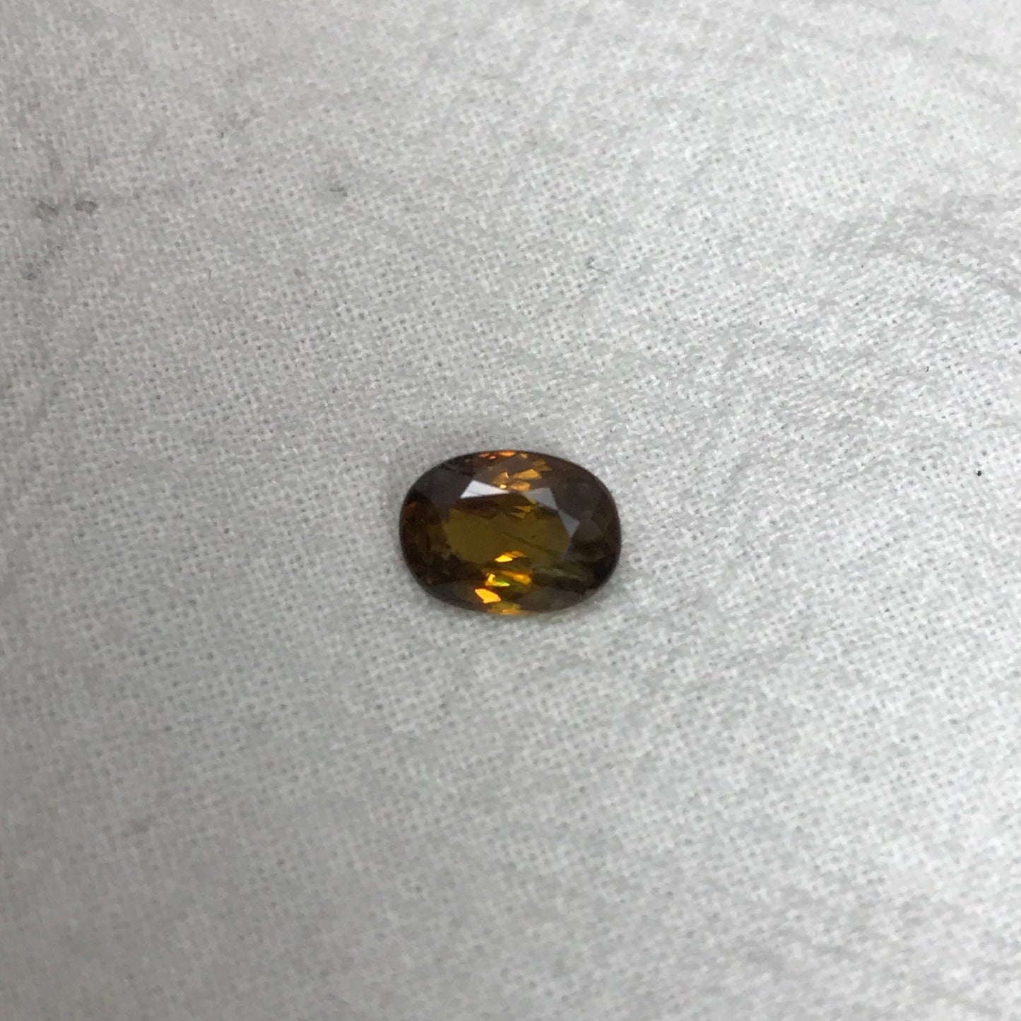 Brownish Yellow Sphene 1.43 Carat 8.3x6.2mm Oval Cut Loose Gemstone