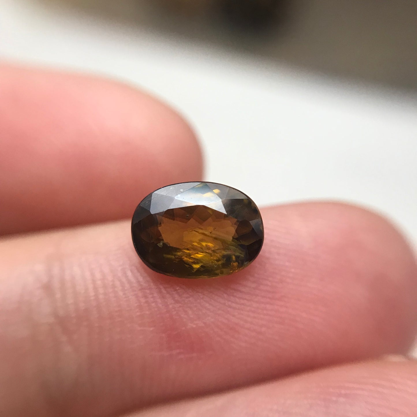 Brownish Yellow Sphene 1.43 Carat 8.3x6.2mm Oval Cut Loose Gemstone