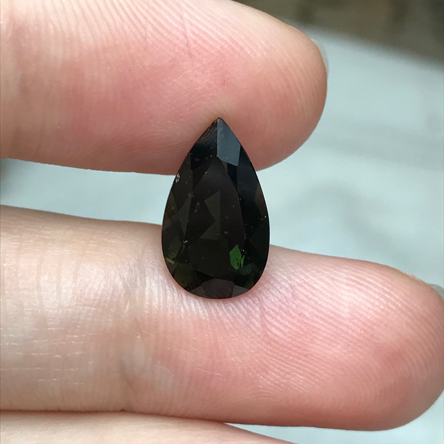 3.47 Carat Green Kornerupine 13.5x8mm Pear Cut, Faceted Green Gemstone, Deep Green