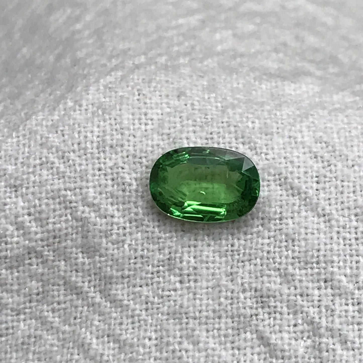 0.66 carat Natural Tsavorite Garnet 7x4.5mm Faceted Oval cut