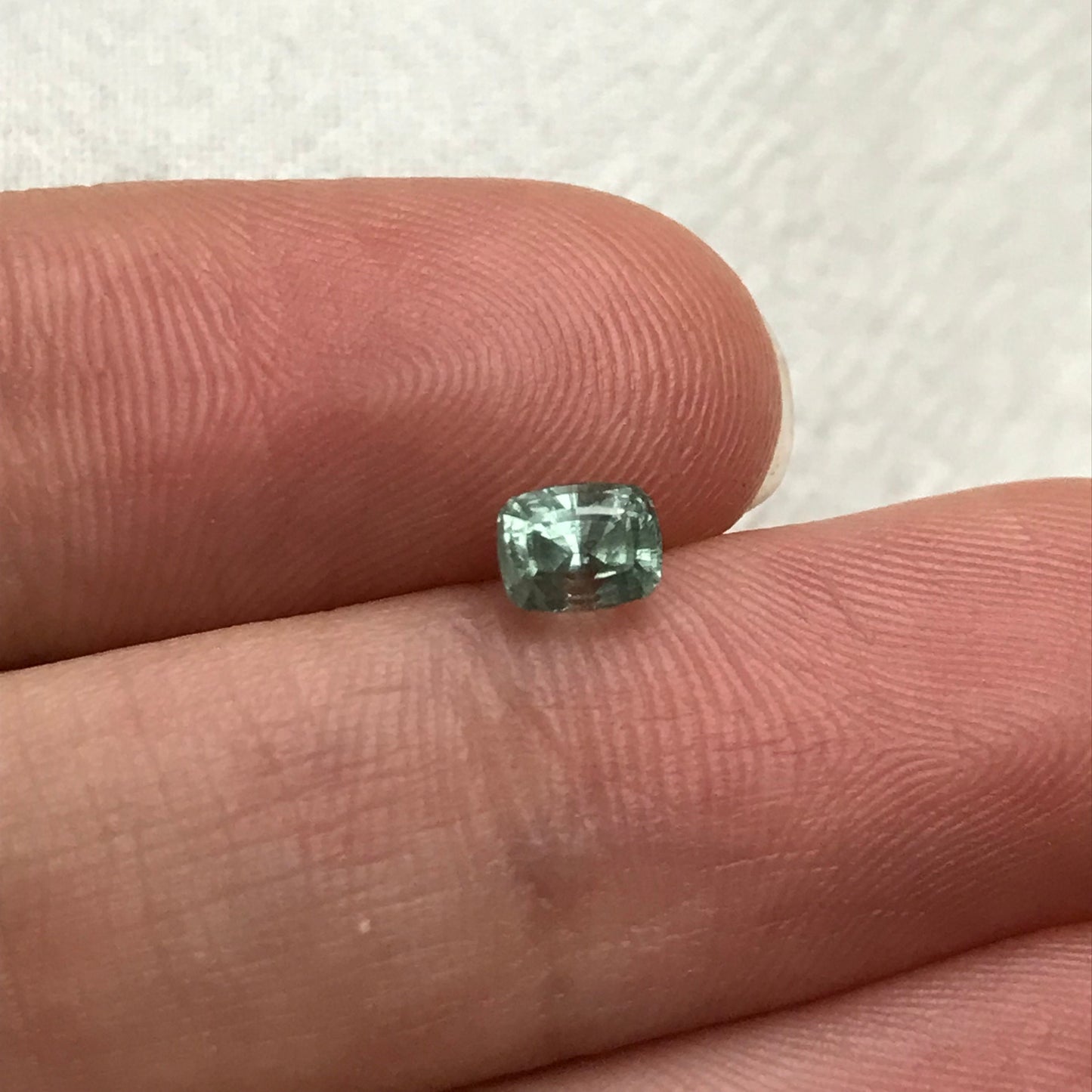 Bluish Green Montana Sapphire 0.69 carat, 4.7x3.7 mm Rectangular Cushion Cut, Unheated Faceted Loose Gemstone