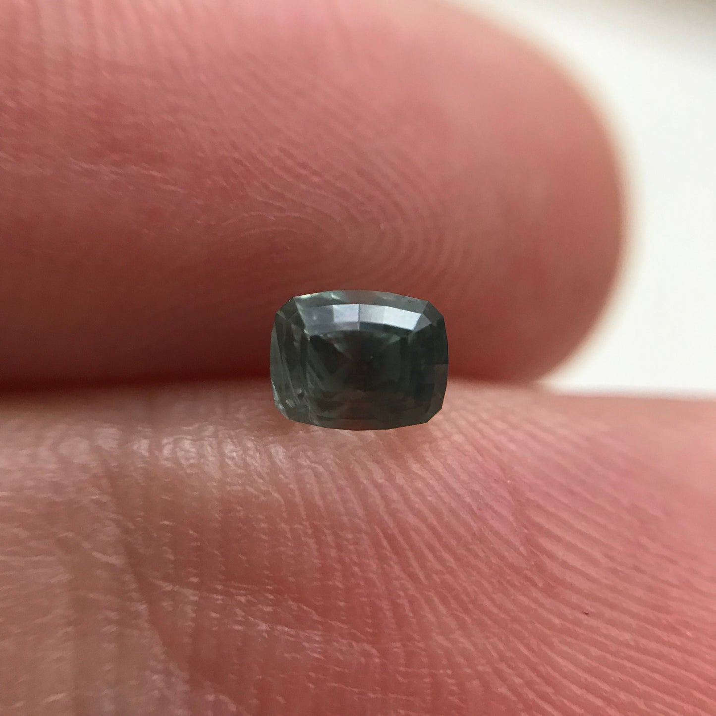 Bluish Green Montana Sapphire 0.69 carat, 4.7x3.7 mm Rectangular Cushion Cut, Unheated Faceted Loose Gemstone
