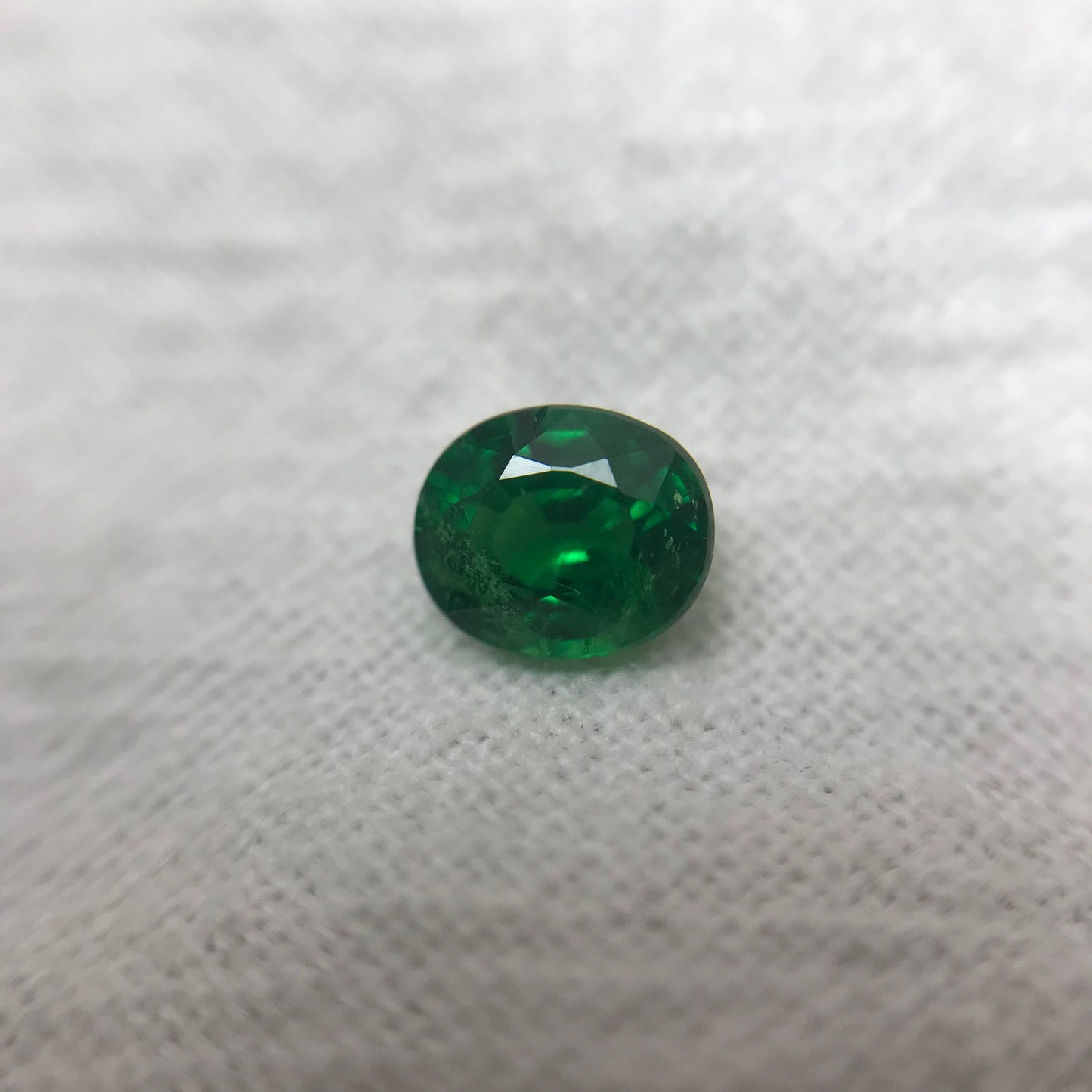 0.60 carat Natural Green Tsavorite Garnet 5.5x4.5mm Oval Cut, Faceted Loose Rich Green
