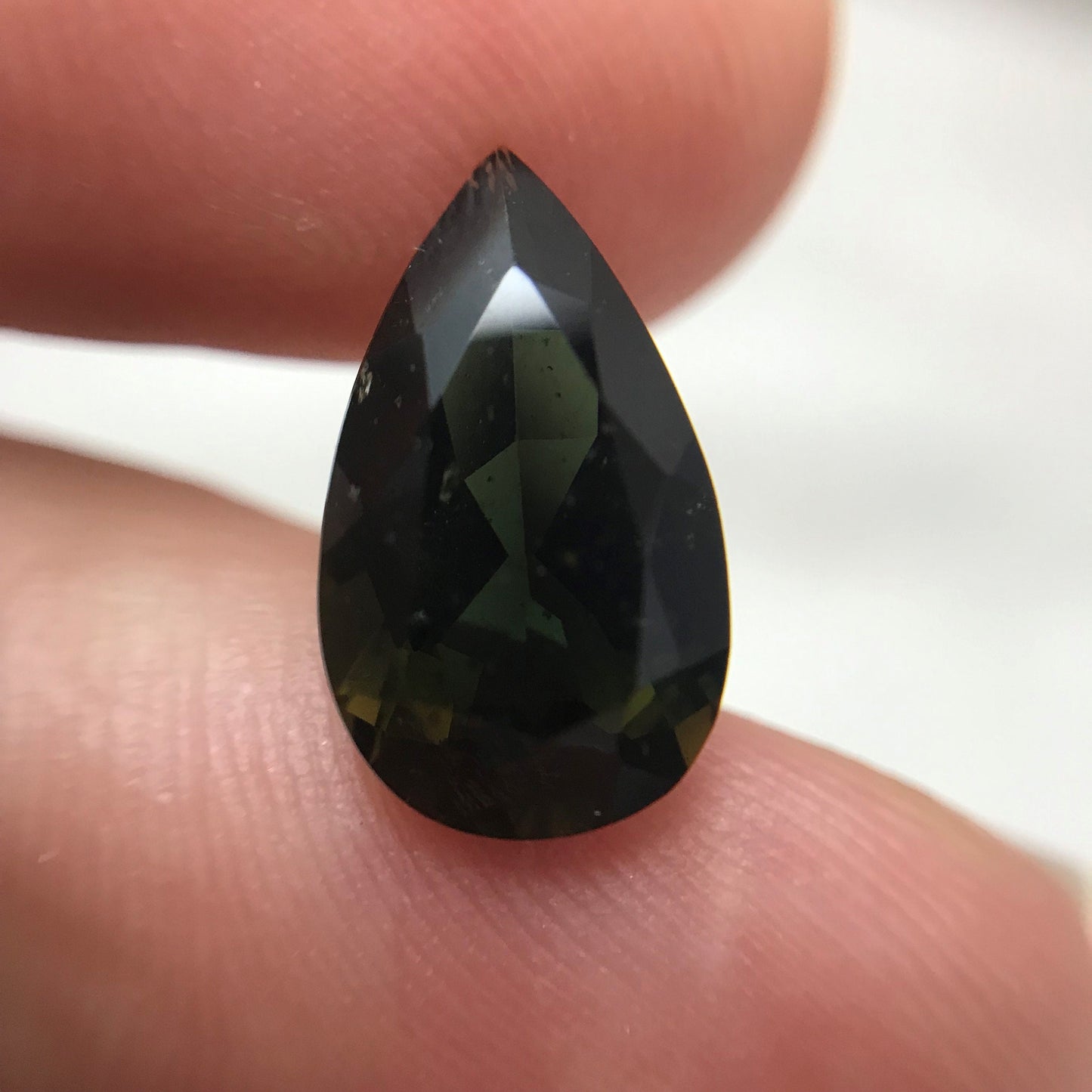 3.47 Carat Green Kornerupine 13.5x8mm Pear Cut, Faceted Green Gemstone, Deep Green